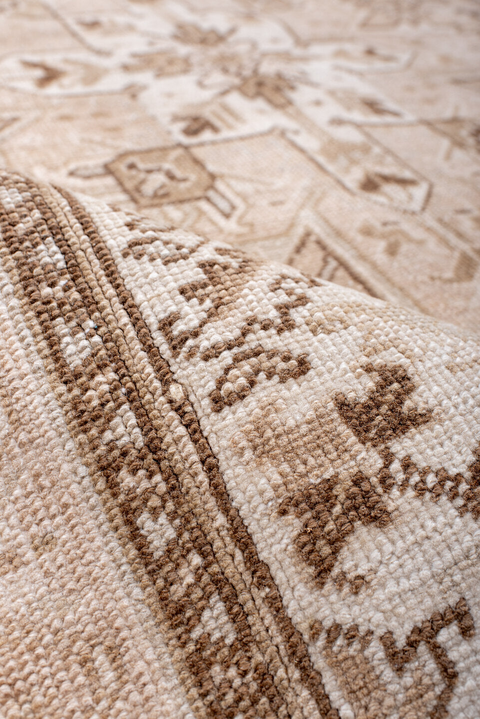 4' x 7' one-of-a-kind handmade antique Heriz rug. Color palette: ivory, blush, camel, taupe, beige, brown, pale blue, pink