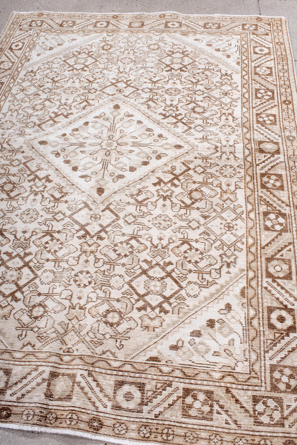5' x 7' one-of-a-kind handmade antique Hamadan rug. Color palette: ivory, camel, taupe, sand, beige, light brown, gray