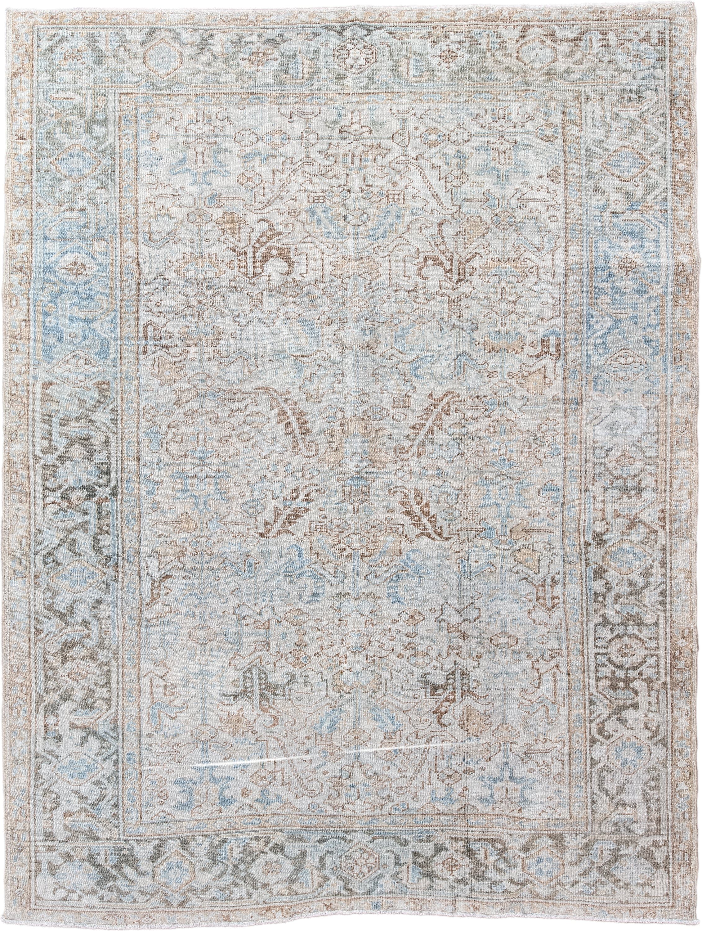 6' x 8' one-of-a-kind handmade antique Heriz medium size rug. Color palette: ivory, powder_blue, taupe, light_brown, beige