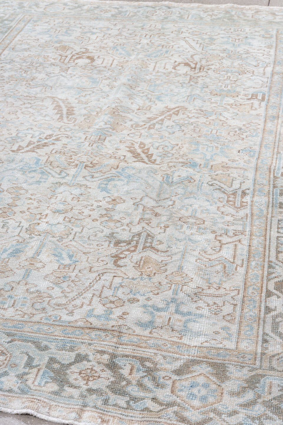 6' x 8' one-of-a-kind handmade antique Heriz medium size rug. Color palette: ivory, powder_blue, taupe, light_brown, beige
