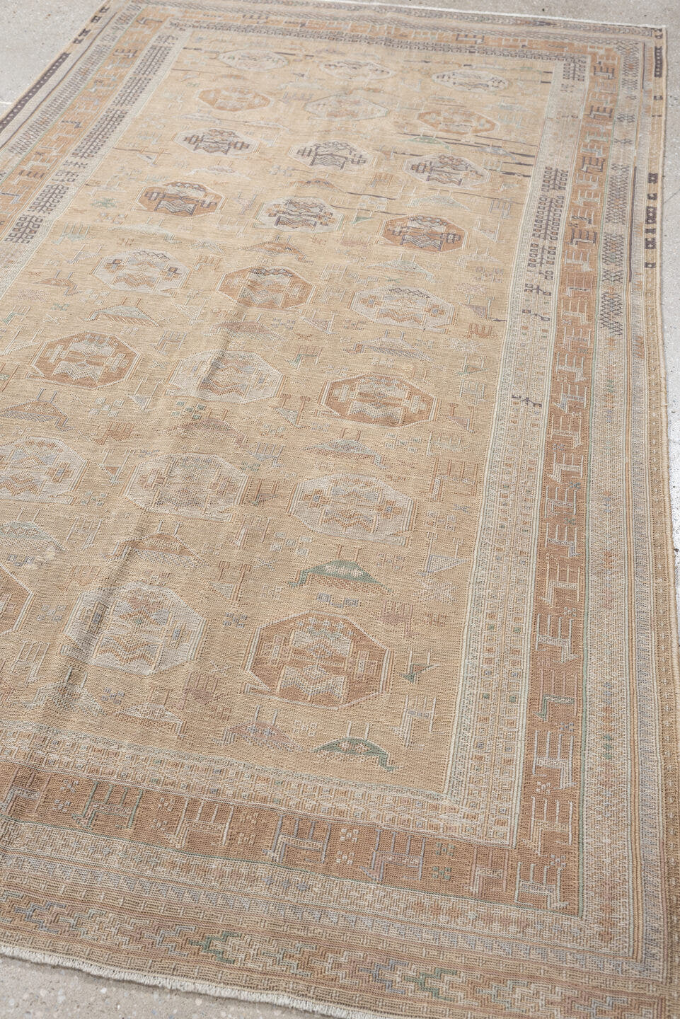 3' x 6' one-of-a-kind handmade antique Sumak small size rug. Color palette: camel, ivory, taupe, dusty rose, blue green