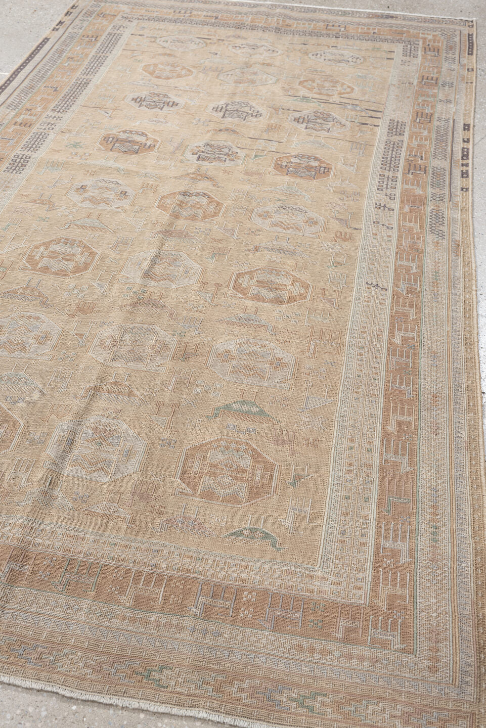 3' x 6' one-of-a-kind handmade antique Sumak small size rug. Color palette: camel, ivory, taupe, dusty rose, blue green