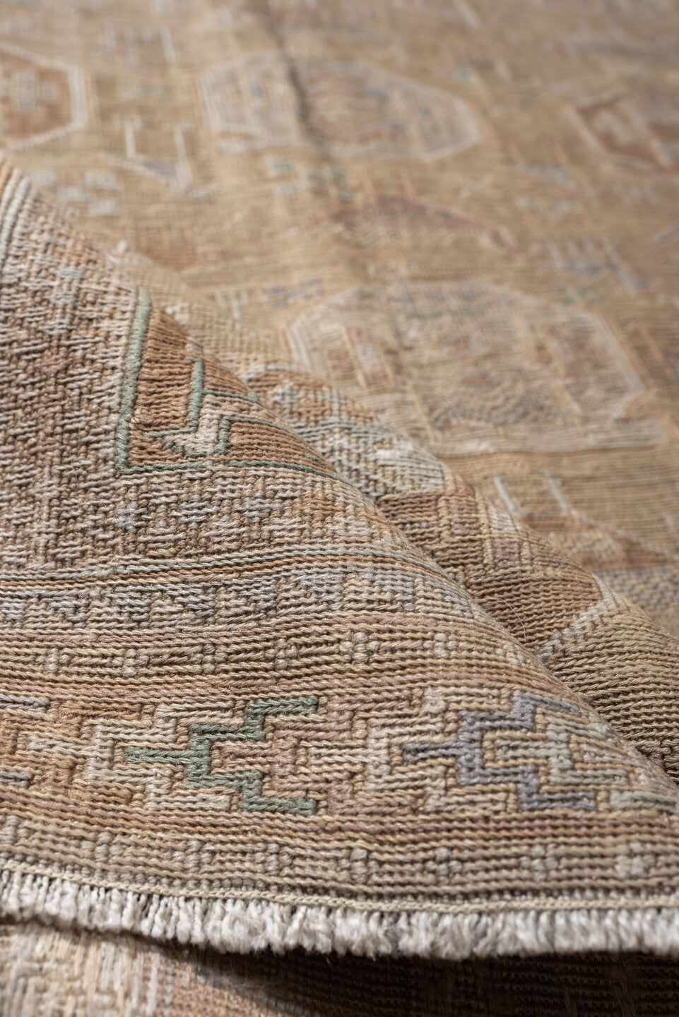 3' x 6' one-of-a-kind handmade antique Sumak small size rug. Color palette: camel, ivory, taupe, dusty rose, blue green