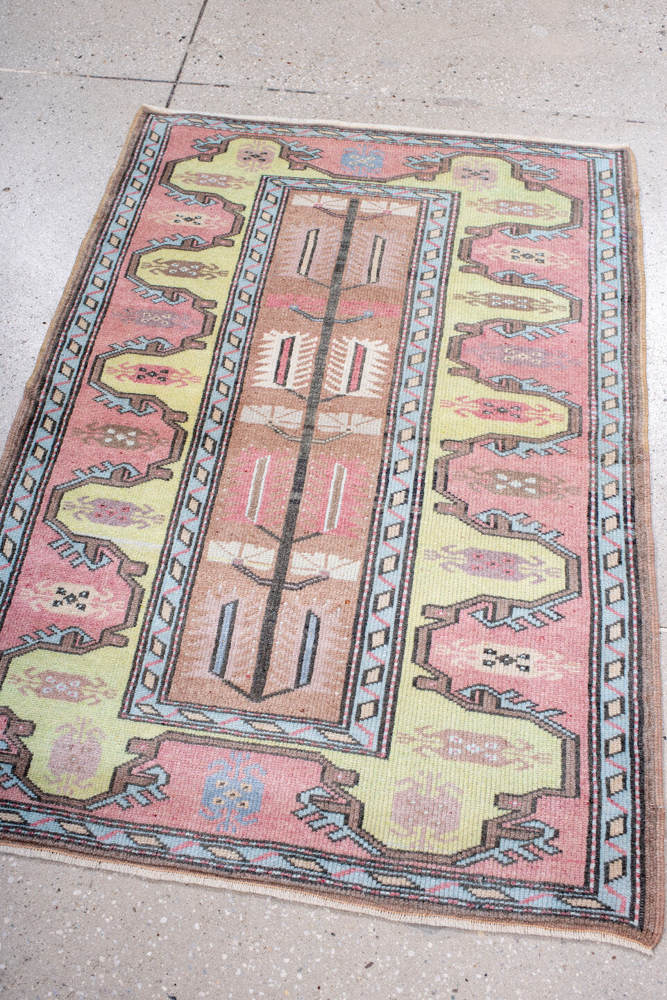 2' x 4' one-of-a-kind handmade antique Anatolian small size rug. Color palette: blush, pale_yellow, sky_blue, brown, ivory
