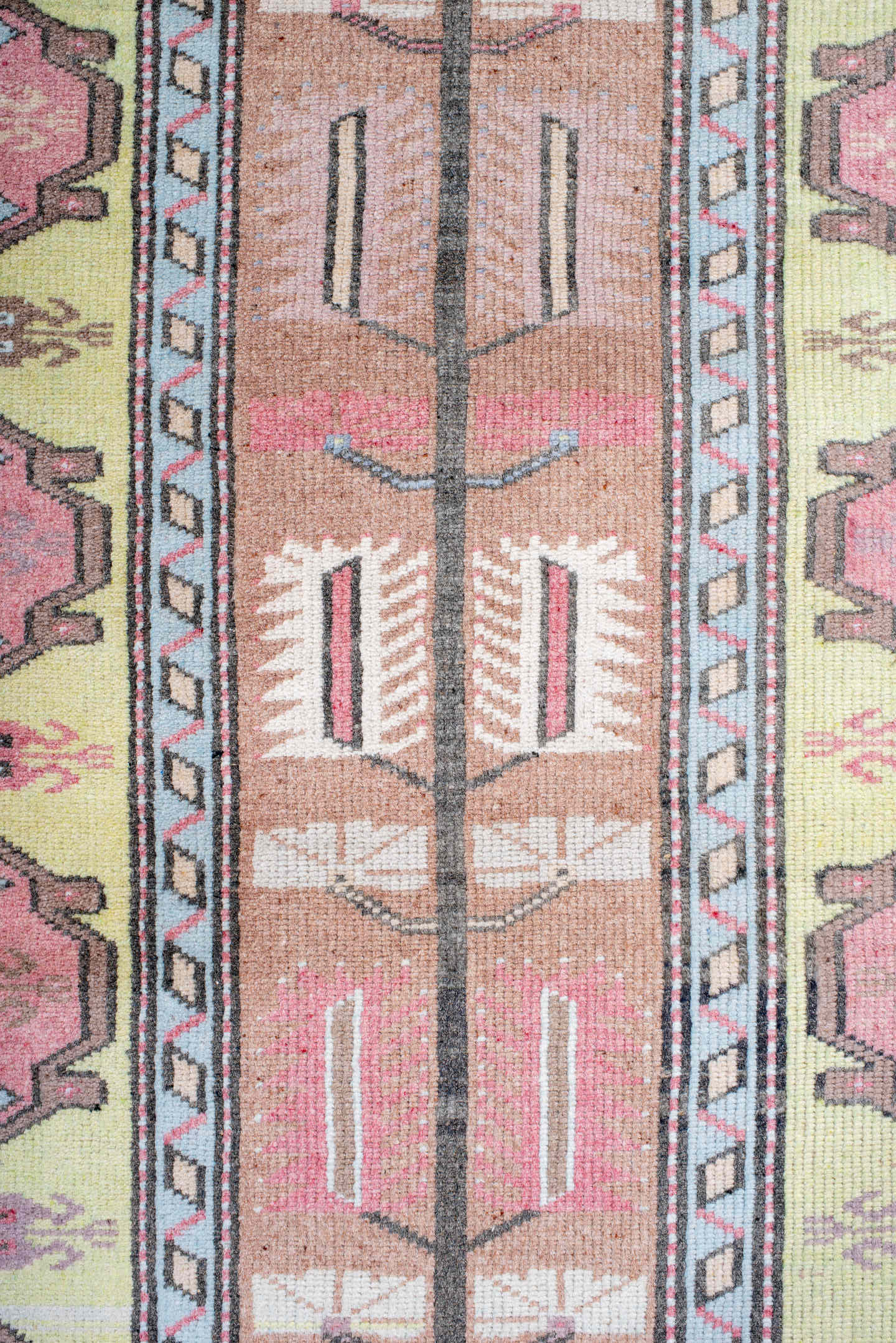 2' x 4' one-of-a-kind handmade antique Anatolian small size rug. Color palette: blush, pale_yellow, sky_blue, brown, ivory