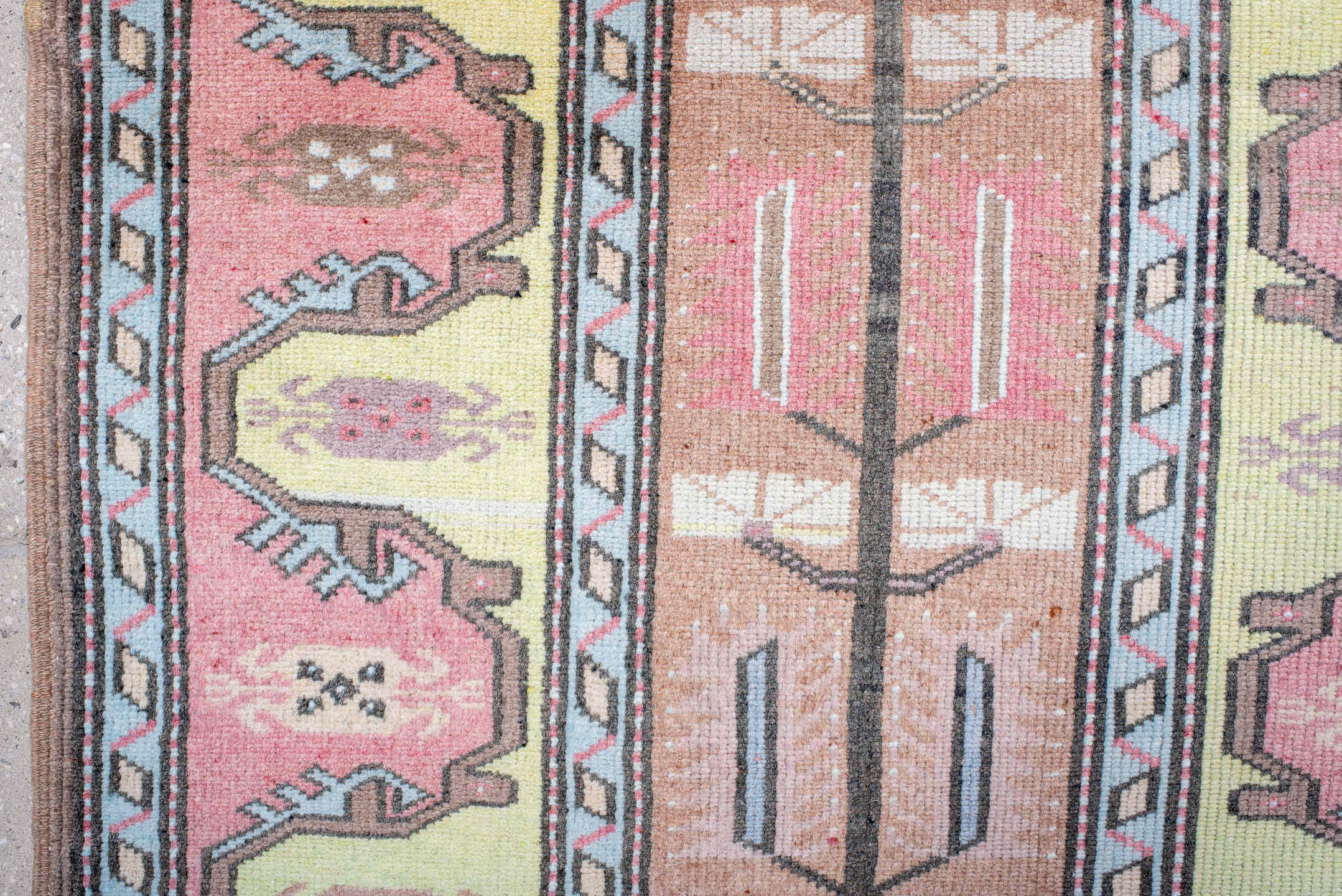 2' x 4' one-of-a-kind handmade antique Anatolian small size rug. Color palette: blush, pale_yellow, sky_blue, brown, ivory
