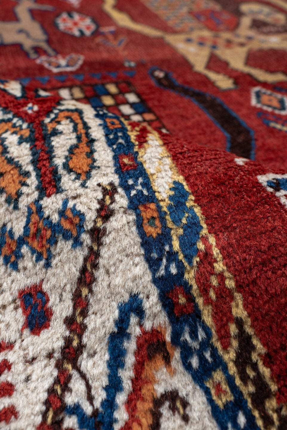 4' x 6' one-of-a-kind handmade antique Shiraz small size rug. Color palette: rust, ivory, navy, coral, camel, indigo, black