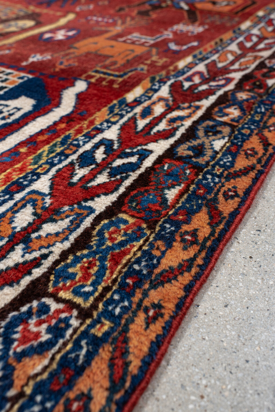 4' x 6' one-of-a-kind handmade antique Shiraz small size rug. Color palette: rust, ivory, navy, coral, camel, indigo, black