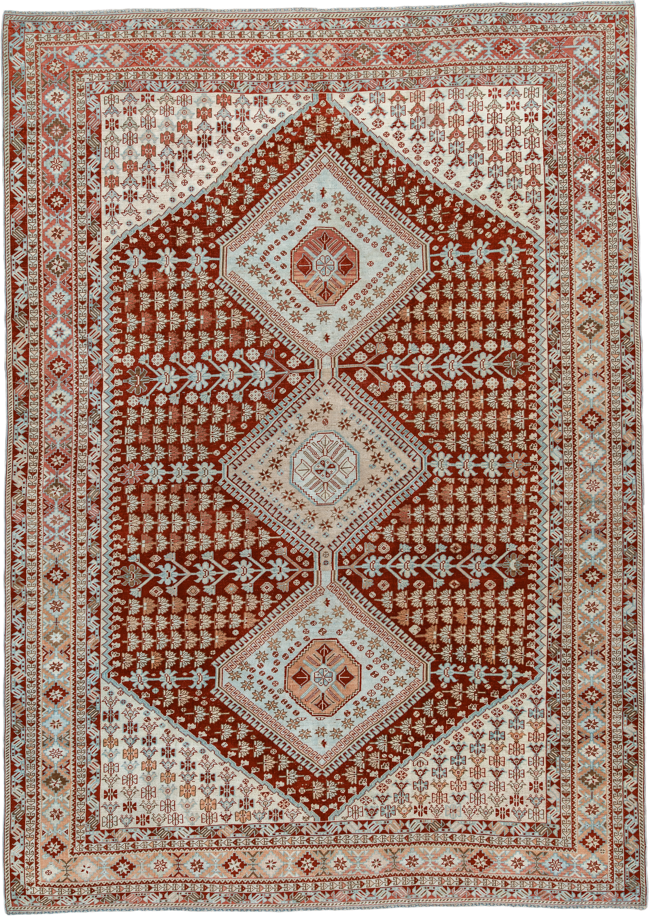 6' x 9' one-of-a-kind handmade antique Shiraz medium size rug. Color palette: rust, ivory, terra cotta, camel, light blue