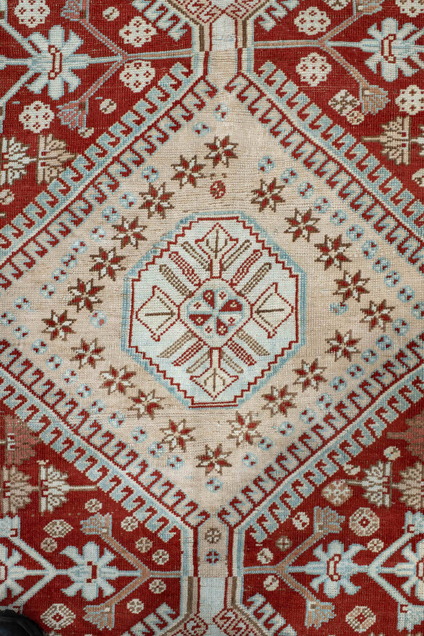 6' x 9' one-of-a-kind handmade antique Shiraz medium size rug. Color palette: rust, ivory, terra cotta, camel, light blue