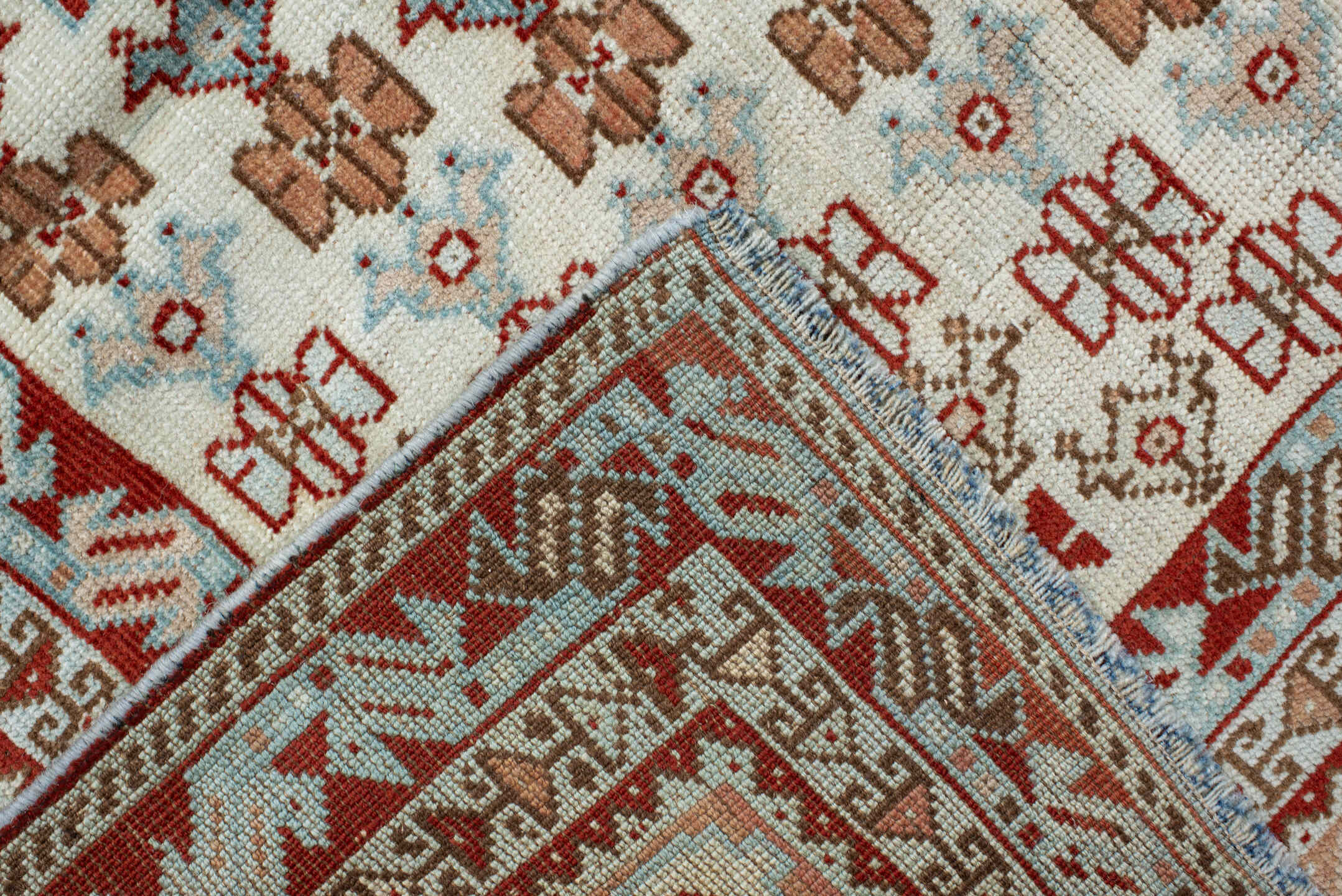 6' x 9' one-of-a-kind handmade antique Shiraz medium size rug. Color palette: rust, ivory, terra cotta, camel, light blue