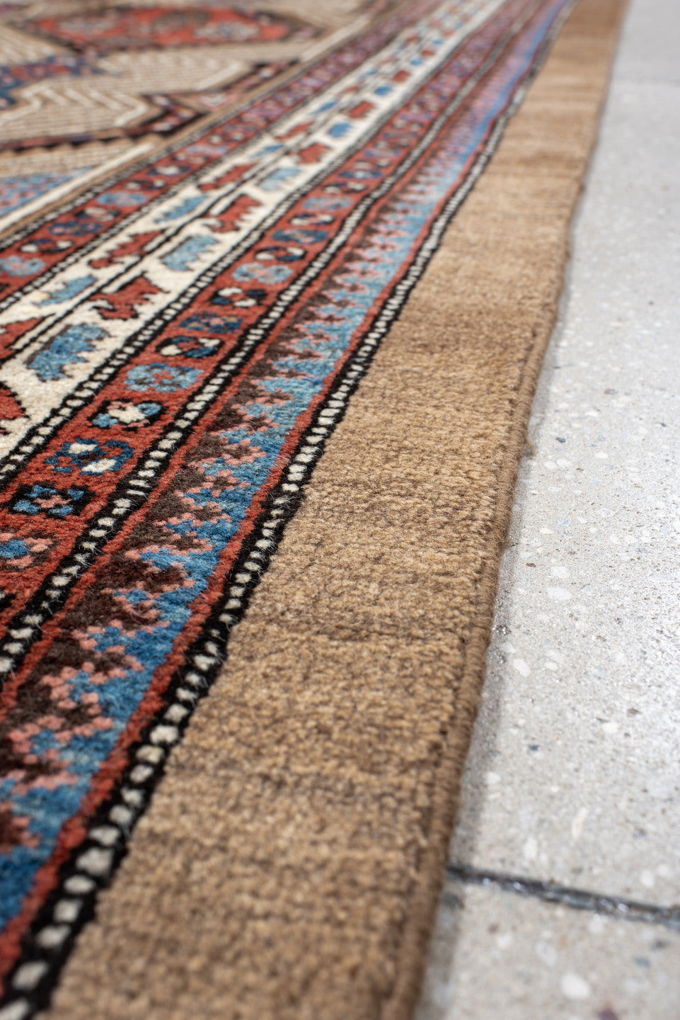 3' x 16' one-of-a-kind handmade antique Sarab runner rug. Color palette: ivory, rust, red, indigo, camel, navy, brown