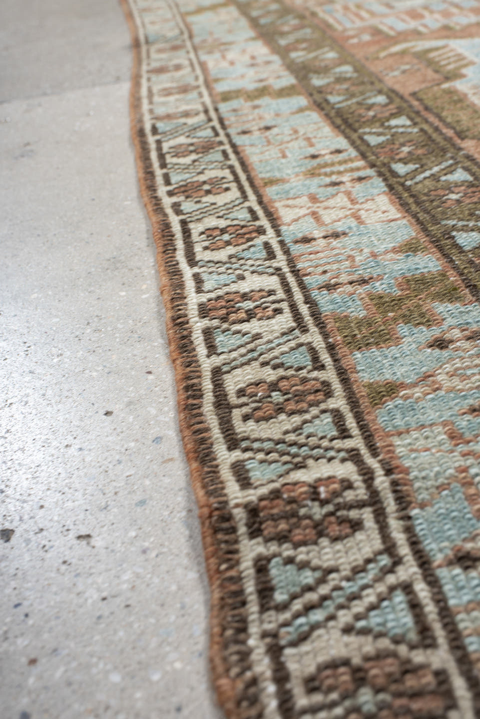 3' x 9' one-of-a-kind handmade antique Heriz runner rug. Color palette: terra cotta, sky blue, ivory, taupe, charcoal, sage