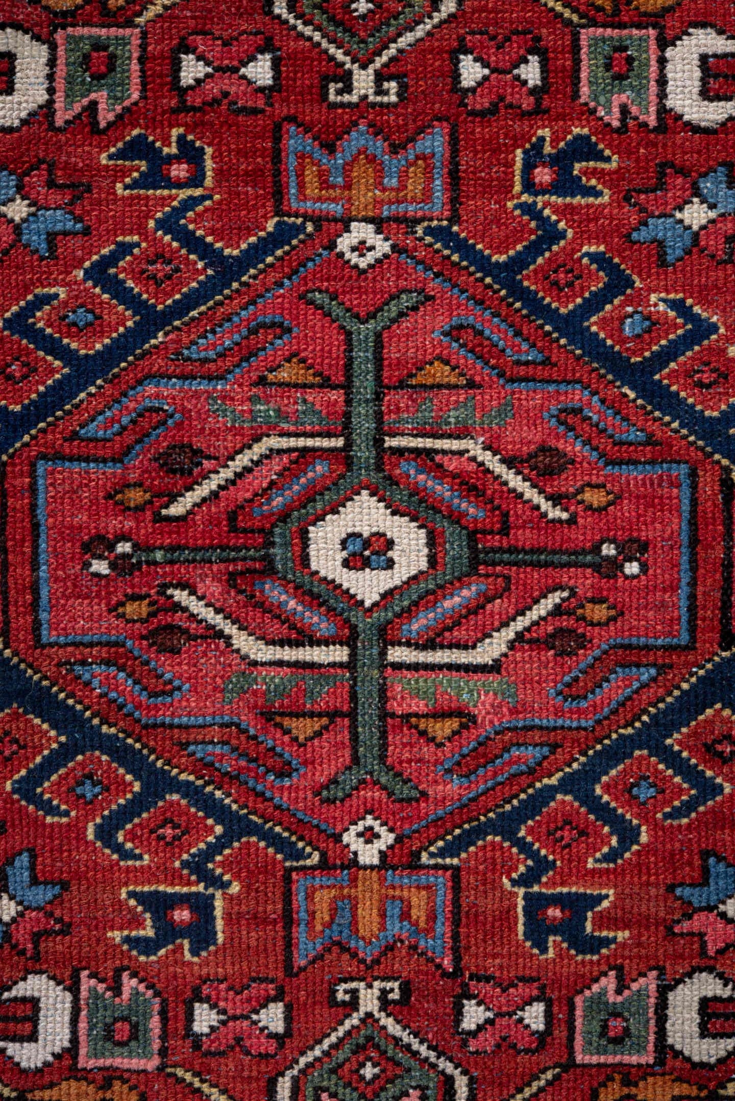 4' x 6' one-of-a-kind handmade vintage Karaje small size rug. Color palette: rust, navy, ivory, sky blue, sage, rose