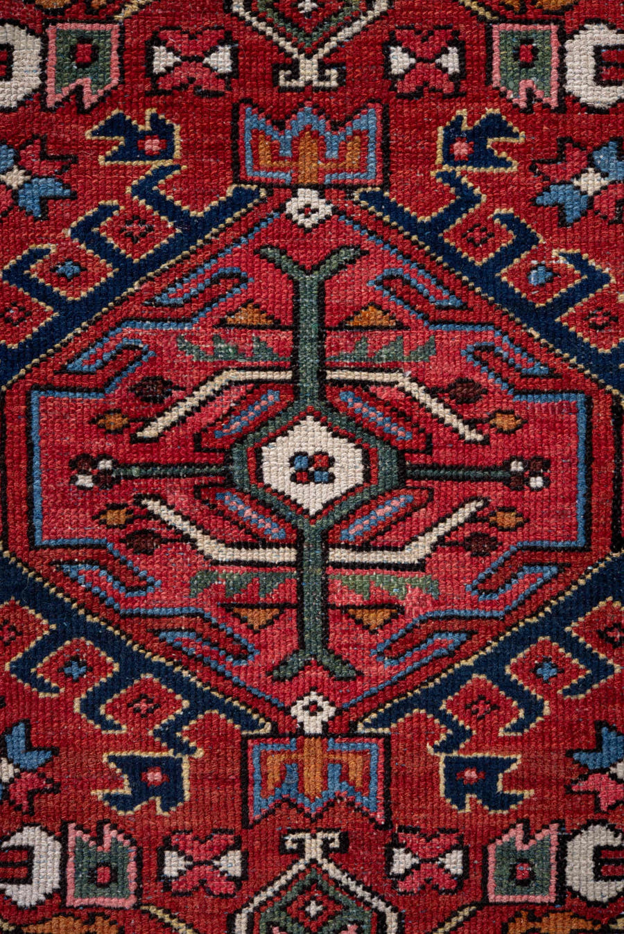 4' x 6' one-of-a-kind handmade vintage Karaje small size rug. Color palette: rust, navy, ivory, sky blue, sage, rose
