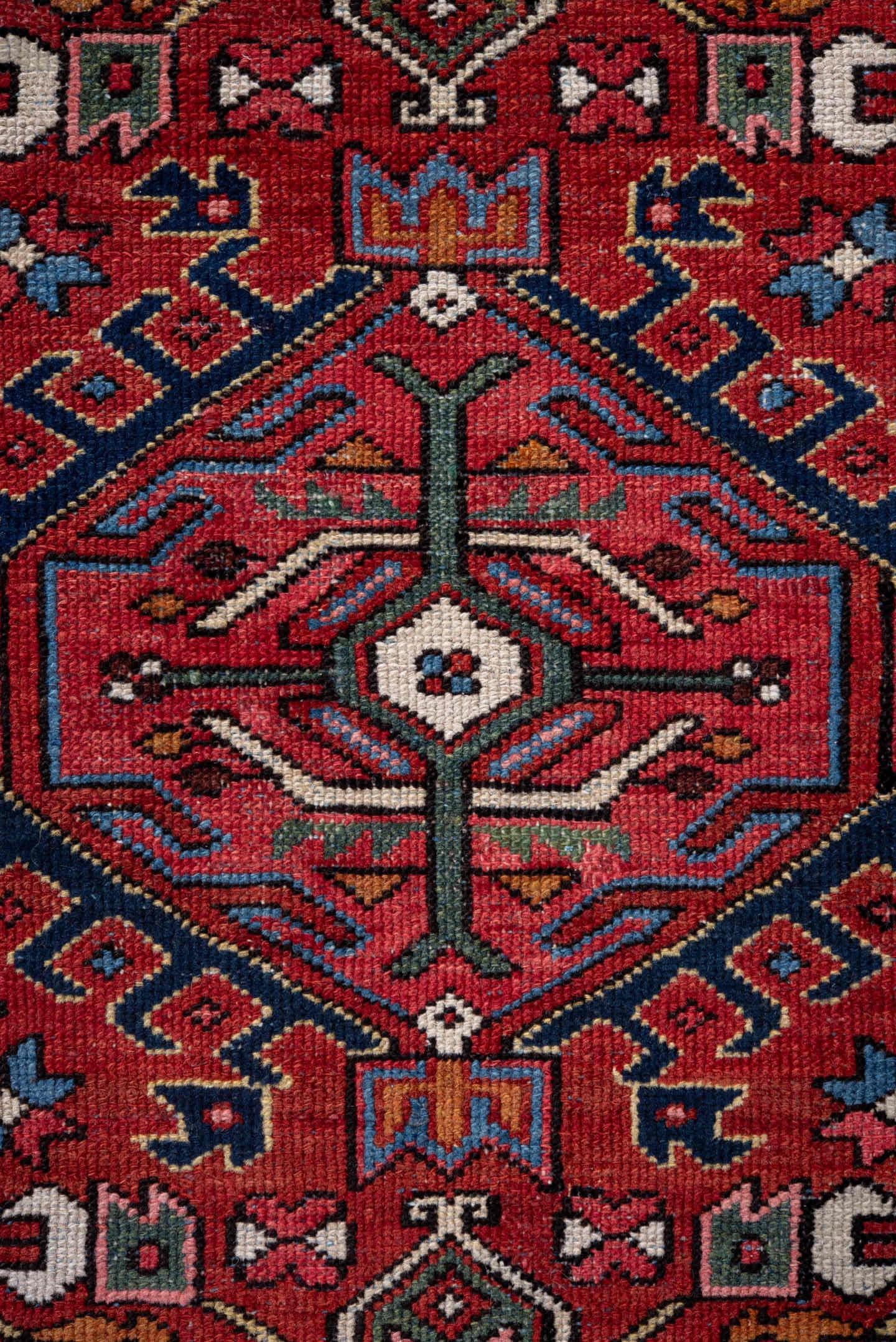 4' x 6' one-of-a-kind handmade vintage Karaje small size rug. Color palette: rust, navy, ivory, sky blue, sage, rose