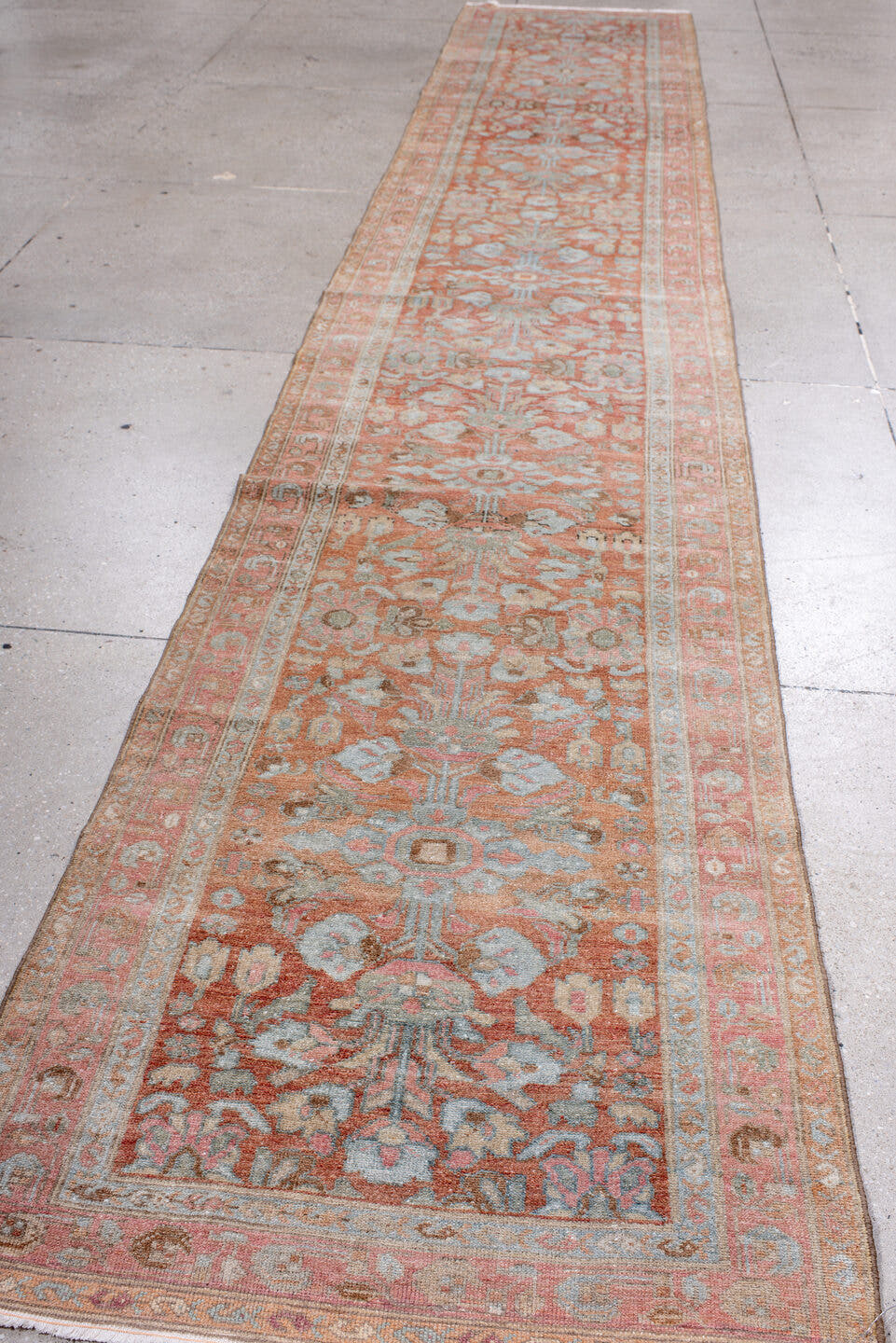2' x 16' one-of-a-kind handmade antique Lilian runner rug. Color palette: terra cotta, ivory, pale blue, rose, taupe, camel