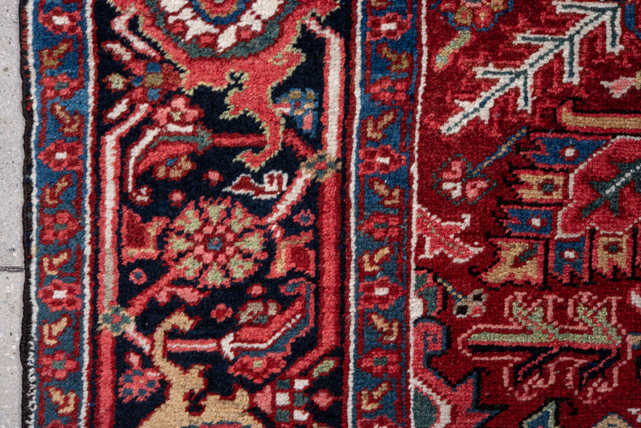 7' x 11' one-of-a-kind handmade vintage Heriz large size rug. Color palette: red, navy, ivory, rust, sky blue, burgundy