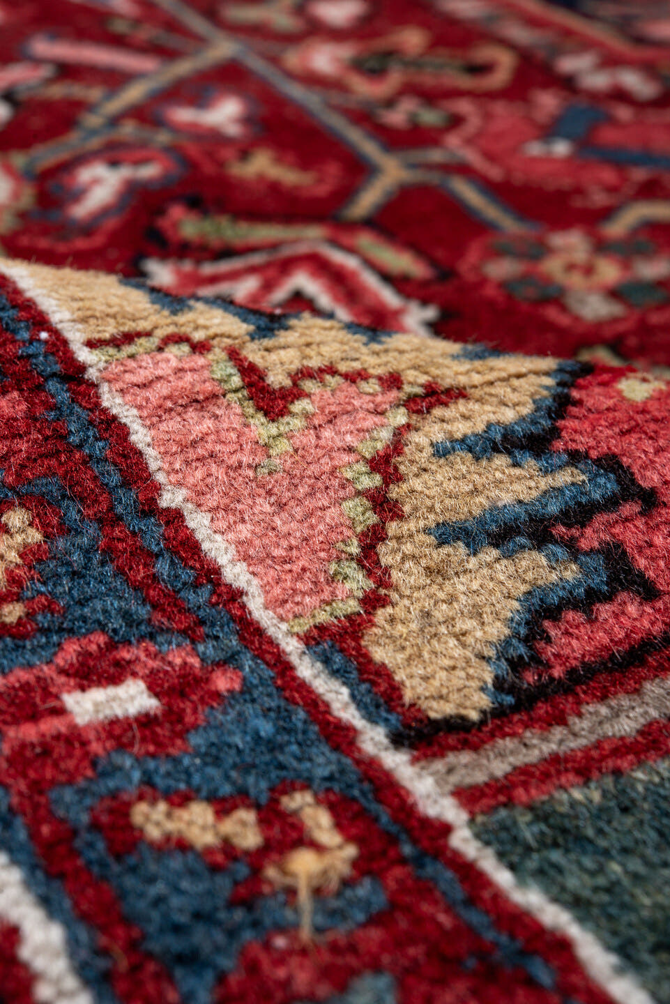 7' x 11' one-of-a-kind handmade vintage Heriz large size rug. Color palette: red, navy, ivory, rust, sky blue, burgundy