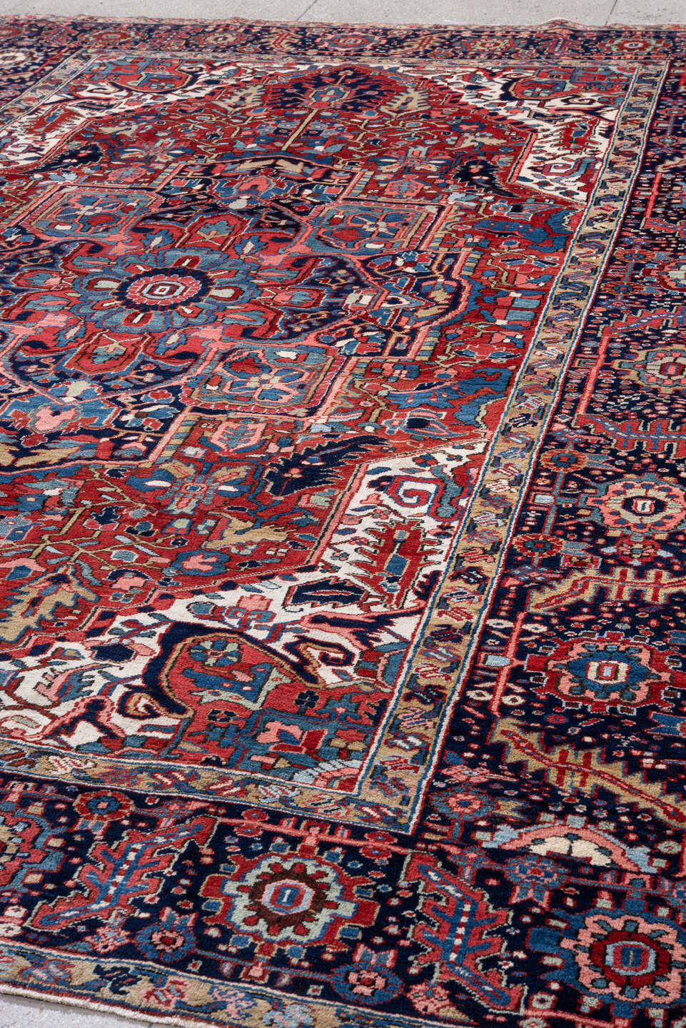 8' x 12' one-of-a-kind handmade vintage Heriz large size rug. Color palette: red, navy, ivory, sky blue, crimson, charcoal