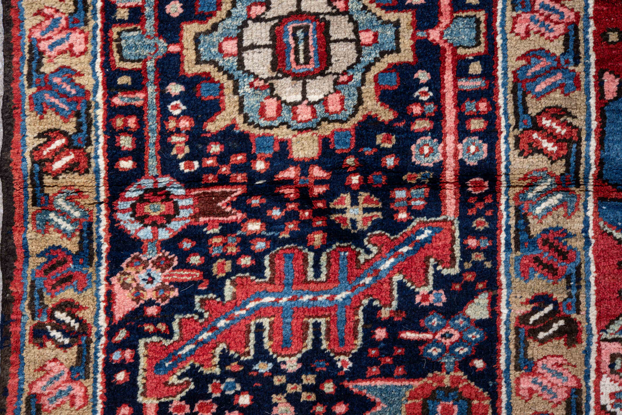 8' x 12' one-of-a-kind handmade vintage Heriz large size rug. Color palette: red, navy, ivory, sky blue, crimson, charcoal