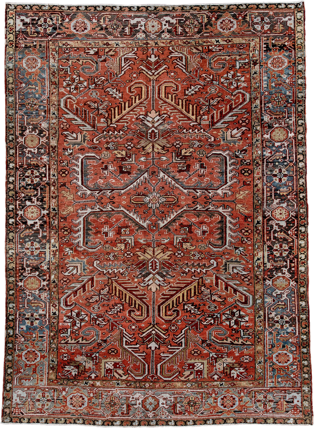 6' x 9' one-of-a-kind handmade antique Heriz rug. Color palette: terra cotta, rust, sky blue, ivory, charcoal, camel