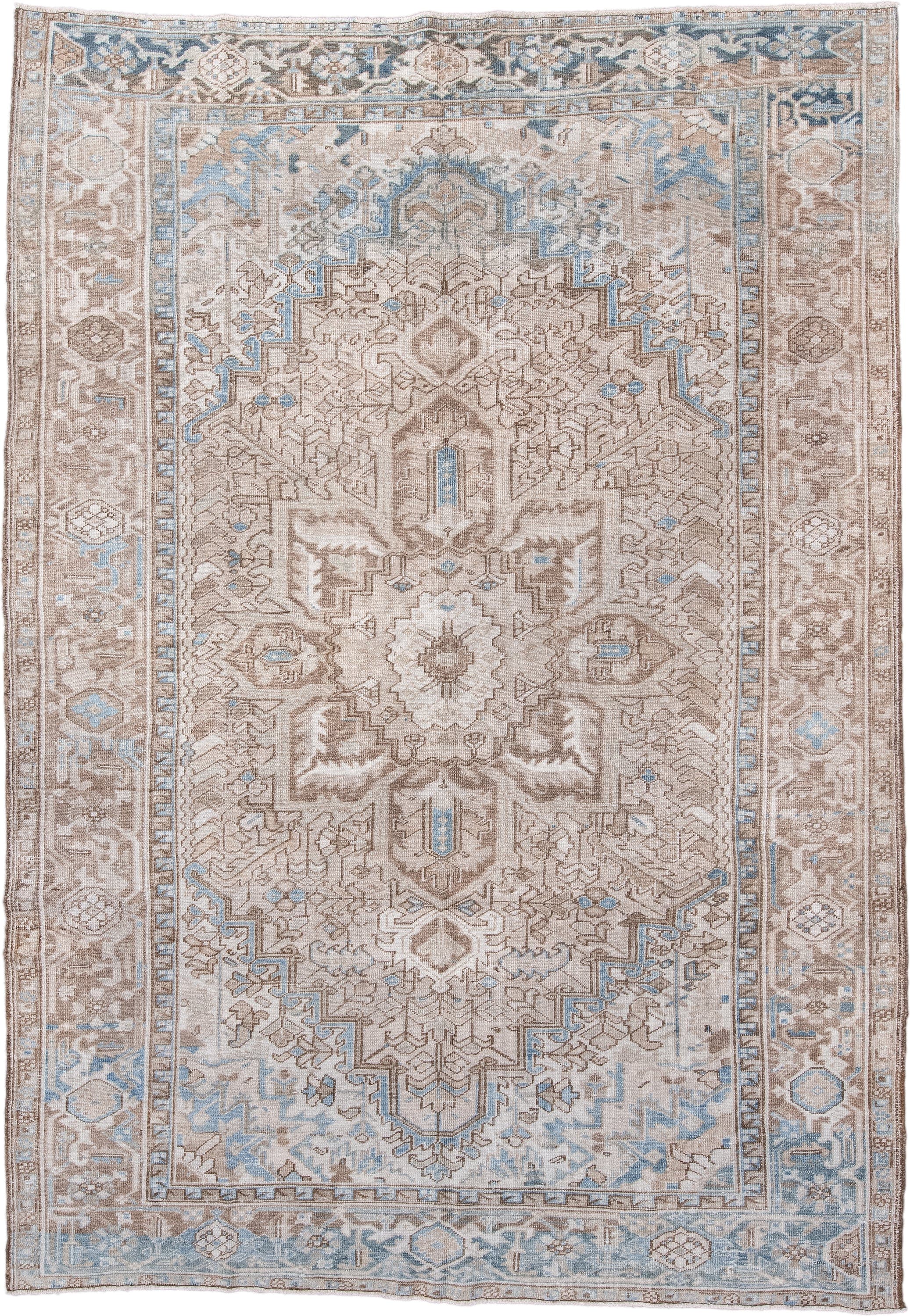 7' x 11' one-of-a-kind handmade antique Heriz large size rug. Color palette: taupe, ivory, powder blue, beige, camel