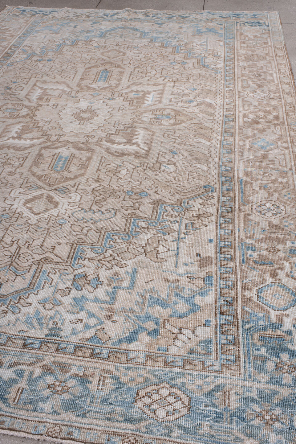 7' x 11' one-of-a-kind handmade antique Heriz large size rug. Color palette: taupe, ivory, powder blue, beige, camel