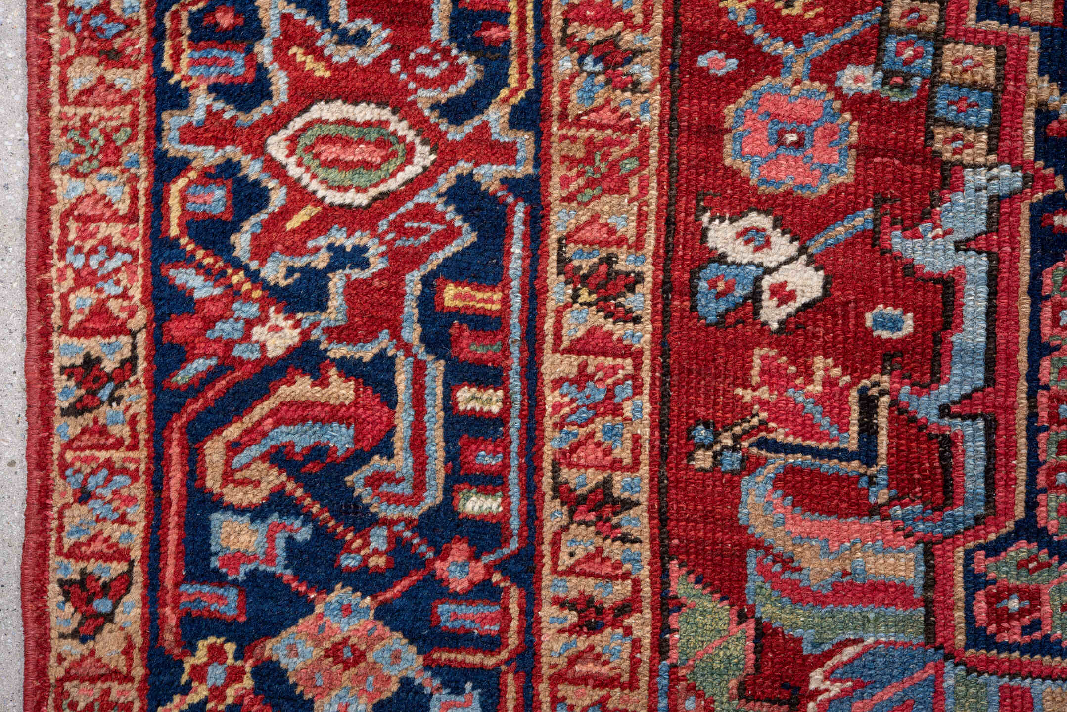 7' x 10' one-of-a-kind handmade vintage Heriz large size rug. Color palette: red, navy, sky blue, ivory, rust, coral, camel