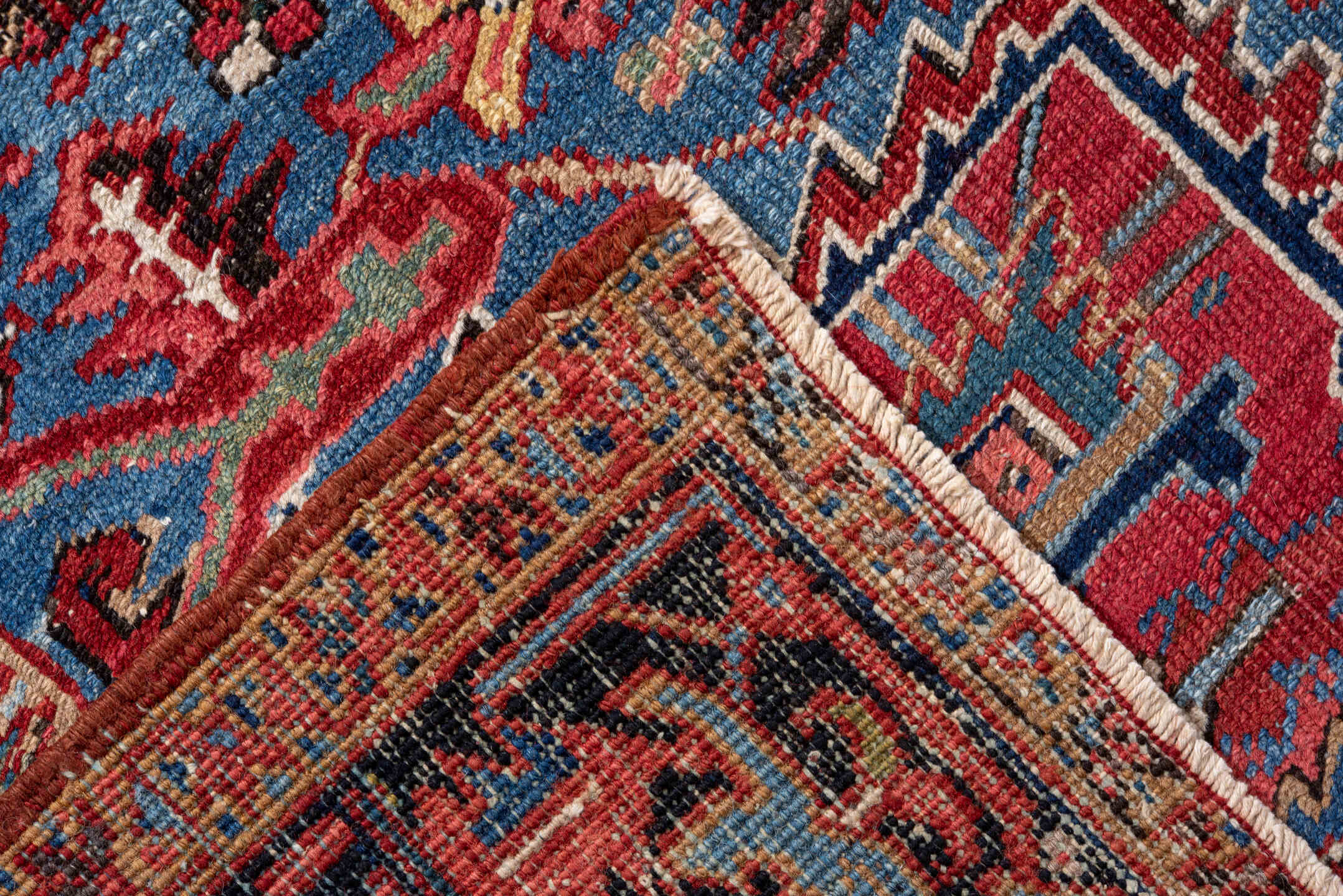 7' x 10' one-of-a-kind handmade vintage Heriz large size rug. Color palette: red, navy, sky blue, ivory, rust, coral, camel