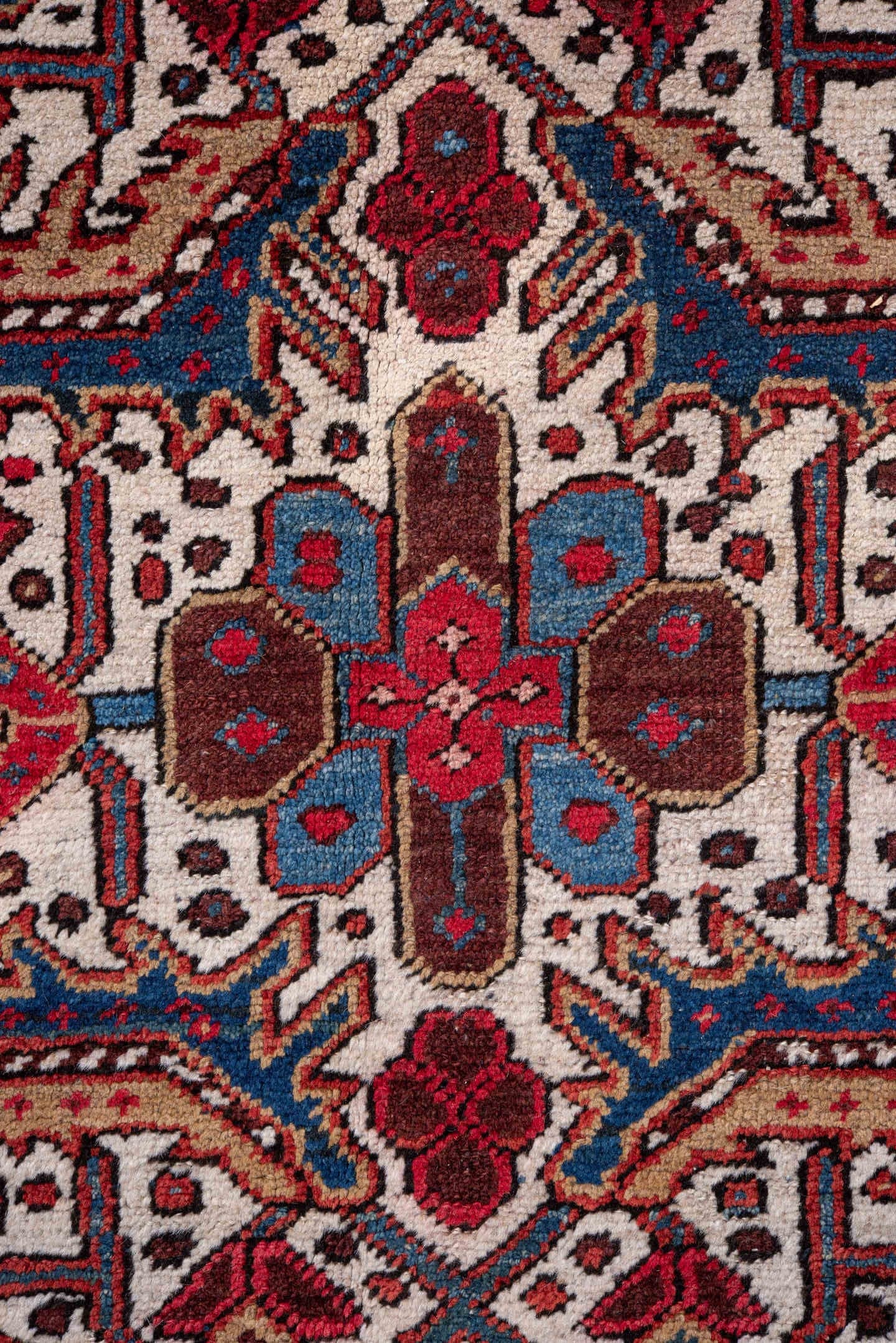 5' x 9' one-of-a-kind handmade vintage Heriz medium size rug. Color palette: ivory, navy, crimson, sky blue, camel, rust