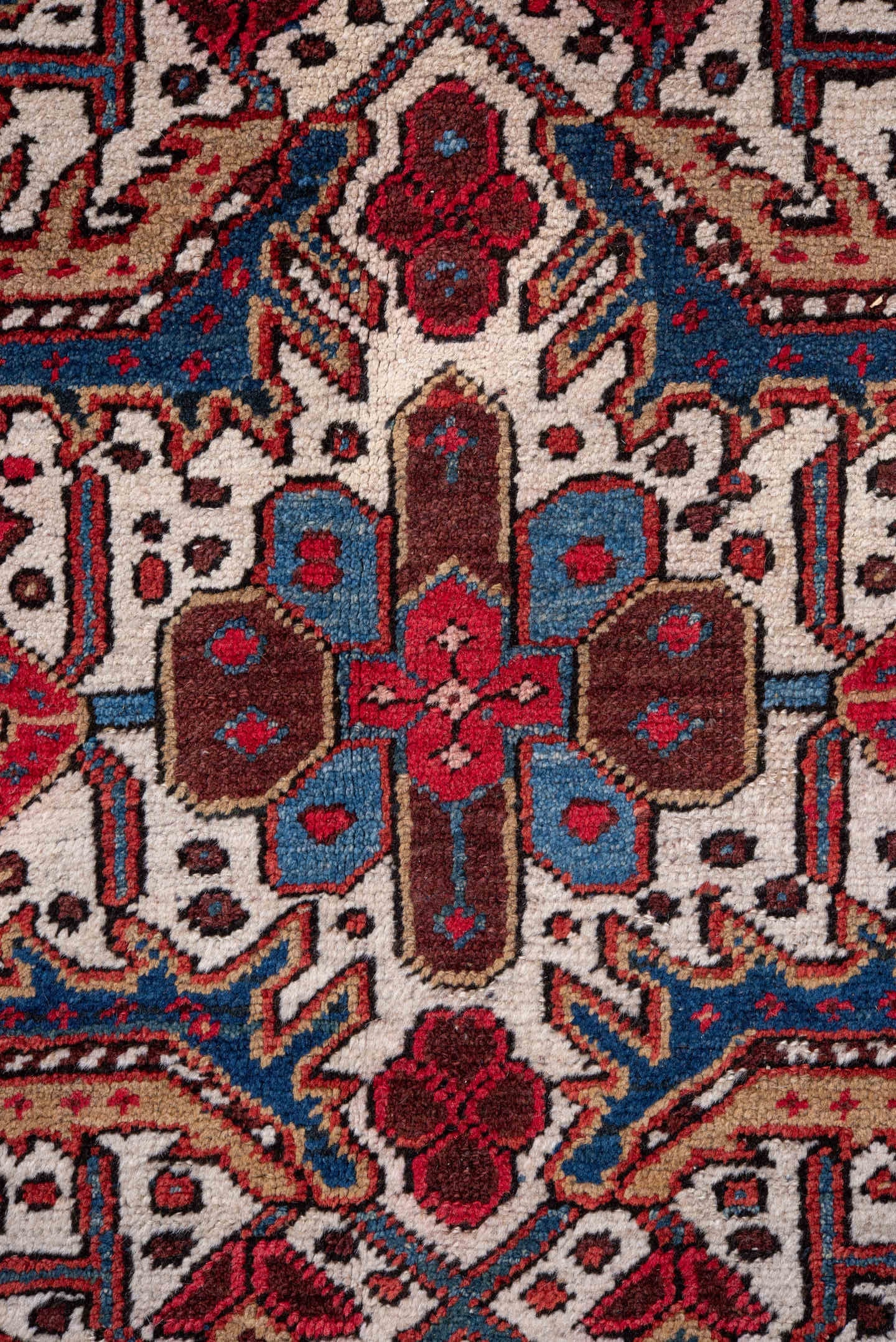 5' x 9' one-of-a-kind handmade vintage Heriz medium size rug. Color palette: ivory, navy, crimson, sky blue, camel, rust
