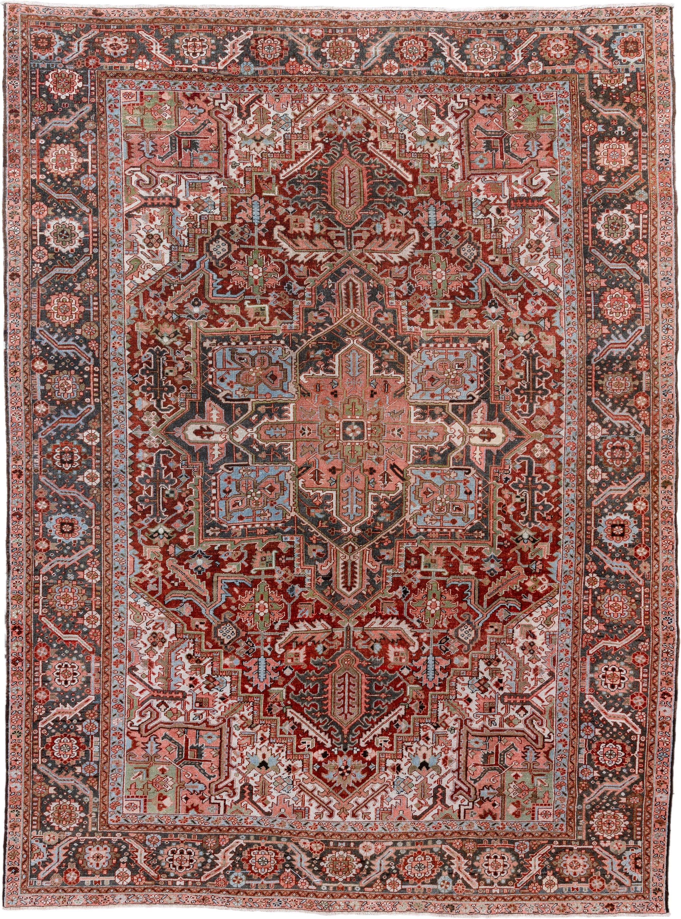9' x 12' one-of-a-kind handmade vintage Heriz large size rug. Color palette: rust, charcoal, ivory, rose, sky blue, sage