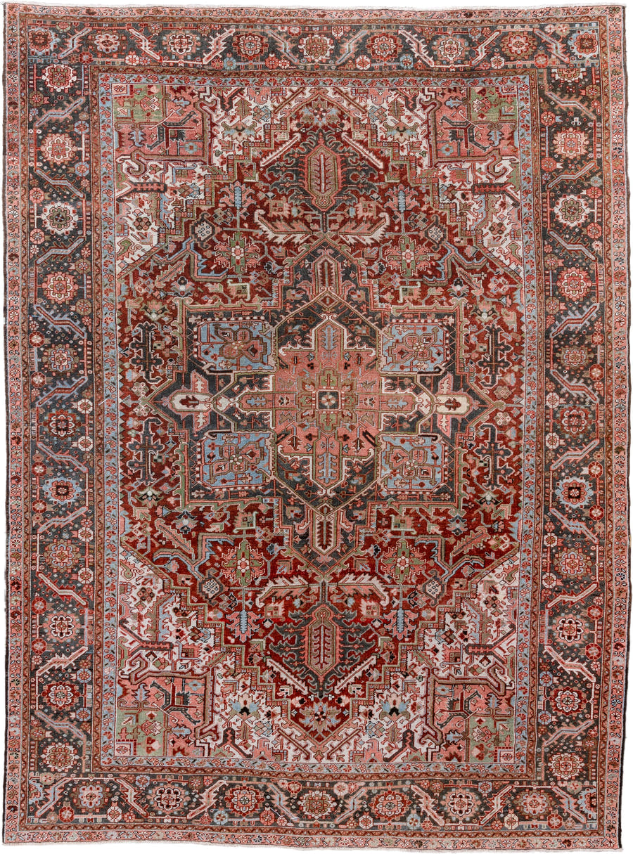 9' x 12' one-of-a-kind handmade vintage Heriz large size rug. Color palette: rust, charcoal, ivory, rose, sky blue, sage