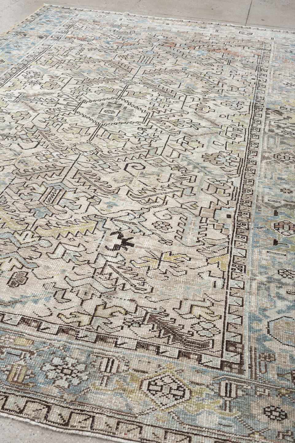 7' x 10' one-of-a-kind handmade vintage Heriz large size rug. Color palette: ivory, sky blue, taupe, charcoal, blush