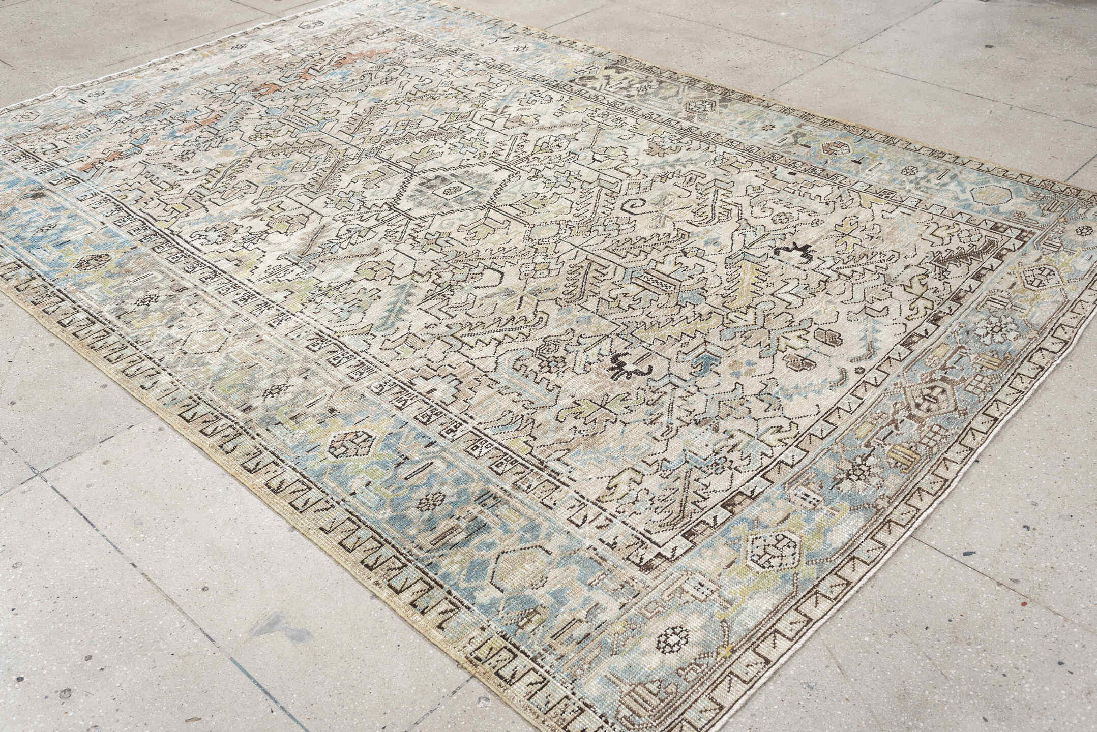 7' x 10' one-of-a-kind handmade vintage Heriz large size rug. Color palette: ivory, sky blue, taupe, charcoal, blush
