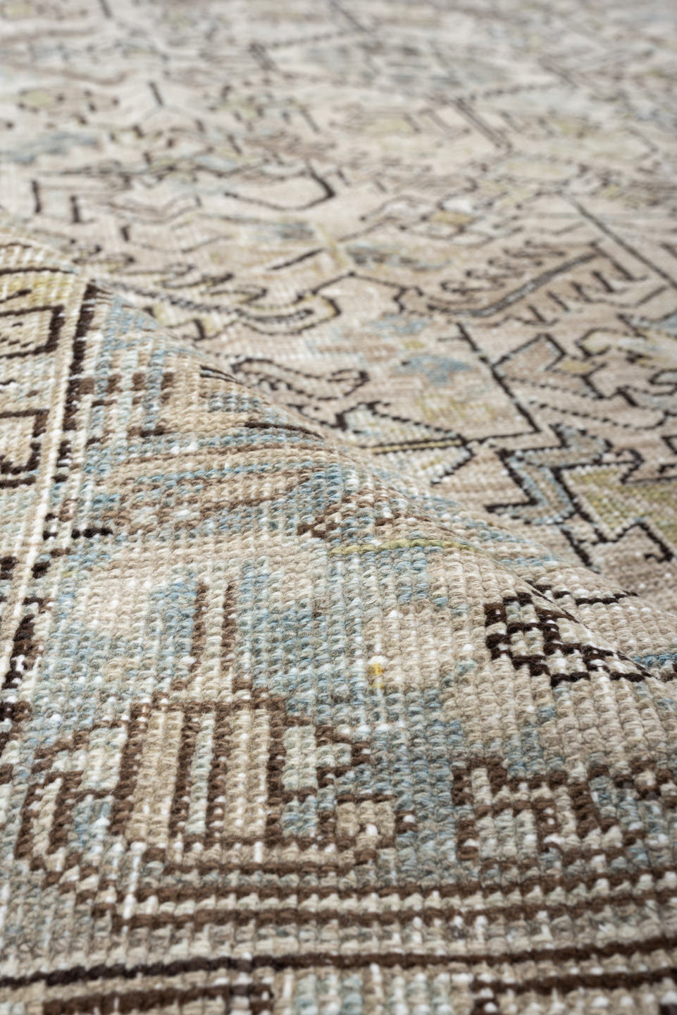7' x 10' one-of-a-kind handmade vintage Heriz large size rug. Color palette: ivory, sky blue, taupe, charcoal, blush
