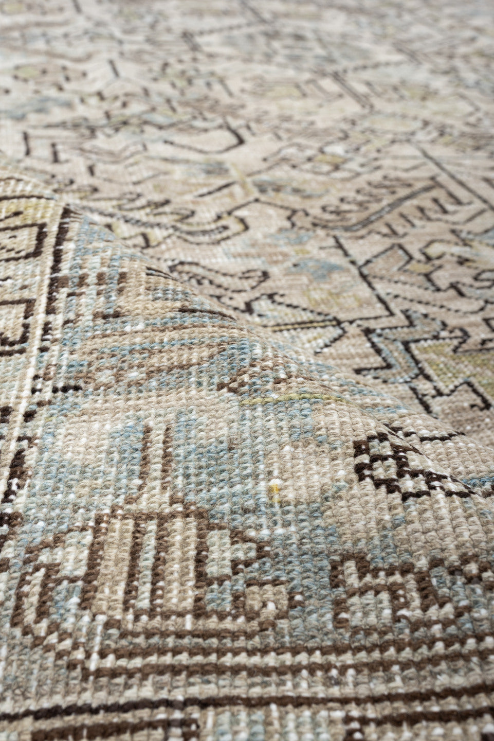 7' x 10' one-of-a-kind handmade vintage Heriz large size rug. Color palette: ivory, sky blue, taupe, charcoal, blush