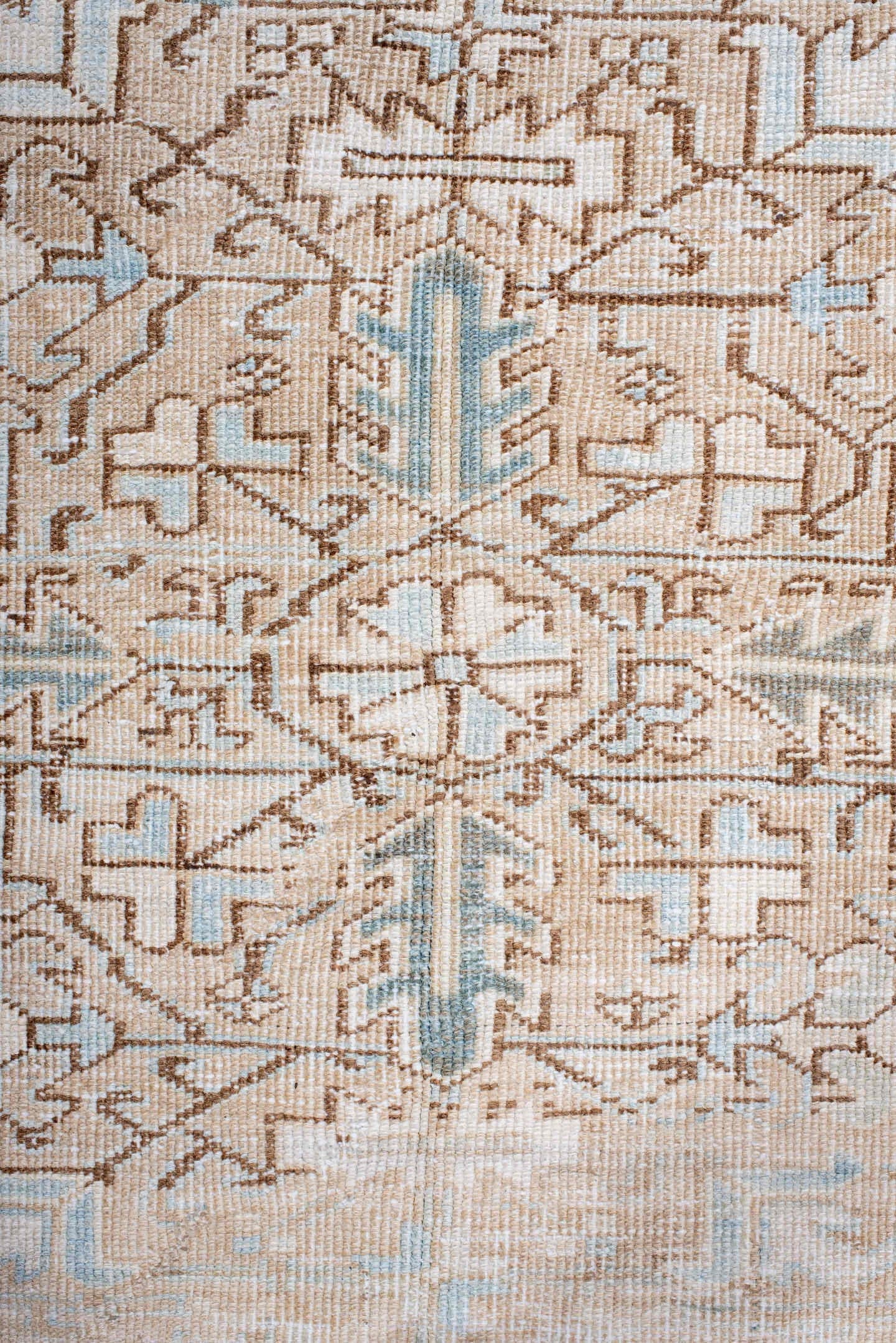 7' x 10' one-of-a-kind handmade antique Heriz large size rug. Color palette: ivory, pale blue, camel, light brown, taupe