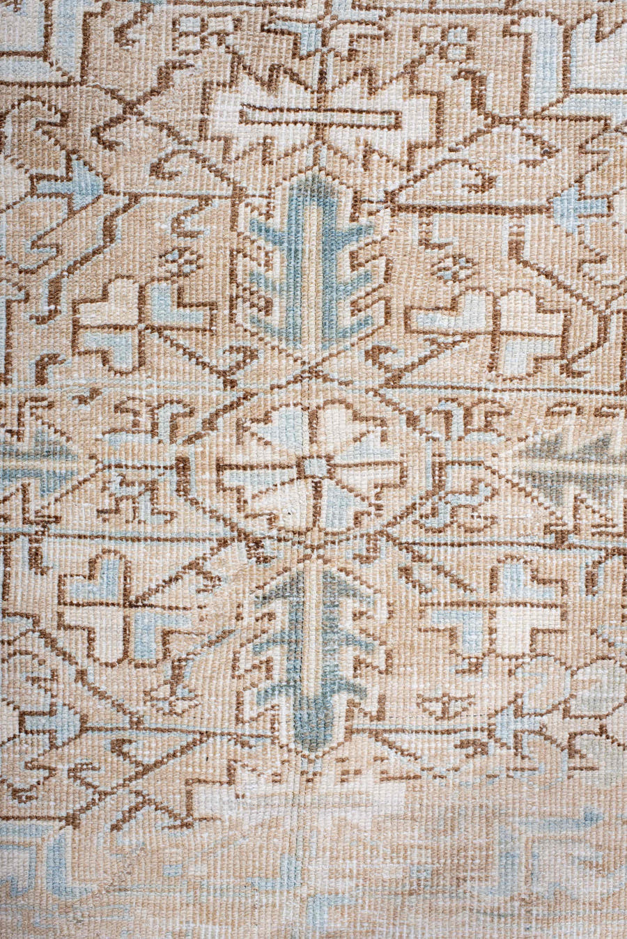 7' x 10' one-of-a-kind handmade antique Heriz large size rug. Color palette: ivory, pale blue, camel, light brown, taupe