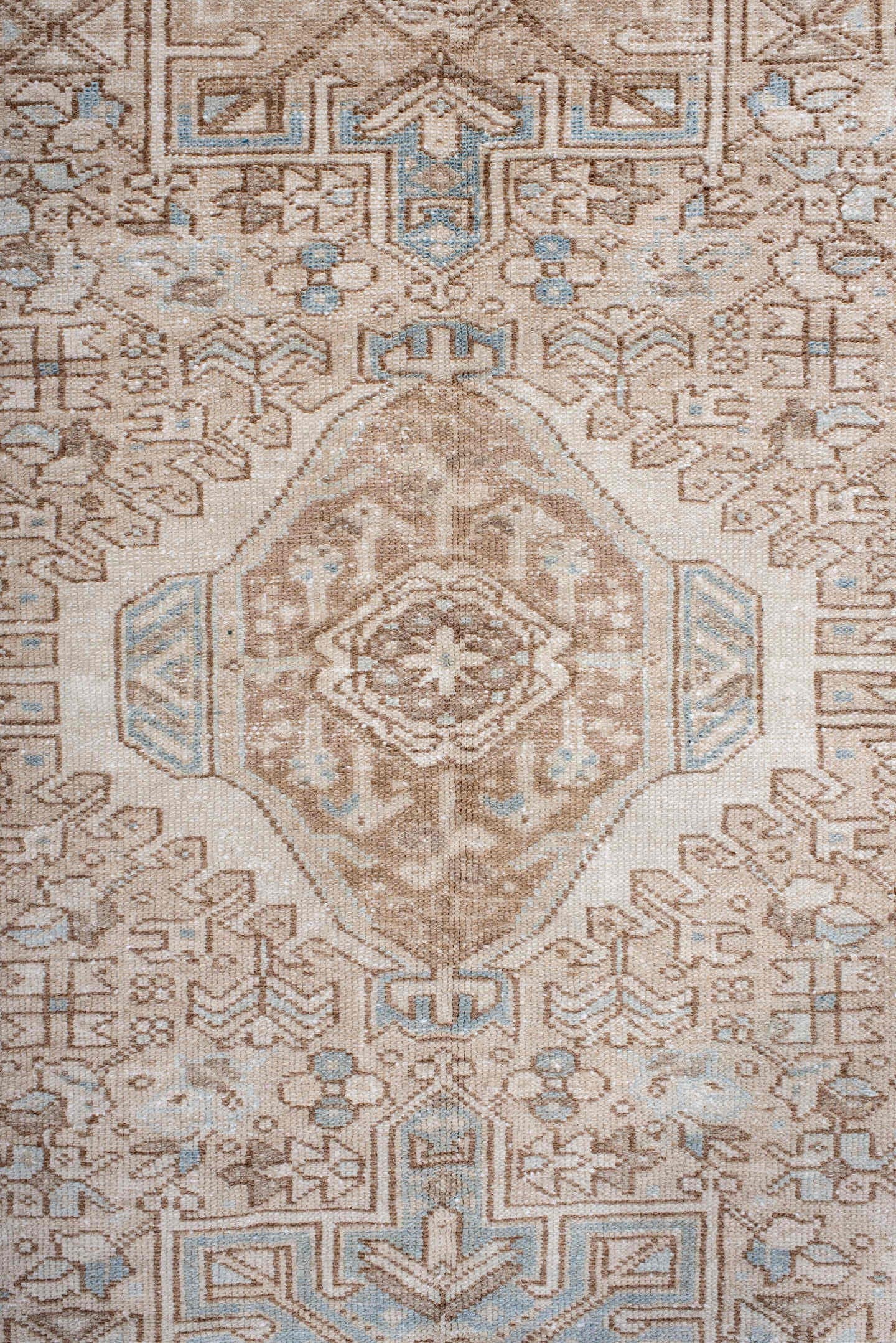 4' x 6' one-of-a-kind handmade antique Karaje rug. Color palette: camel, ivory, sky blue, taupe, beige, light blue, gray