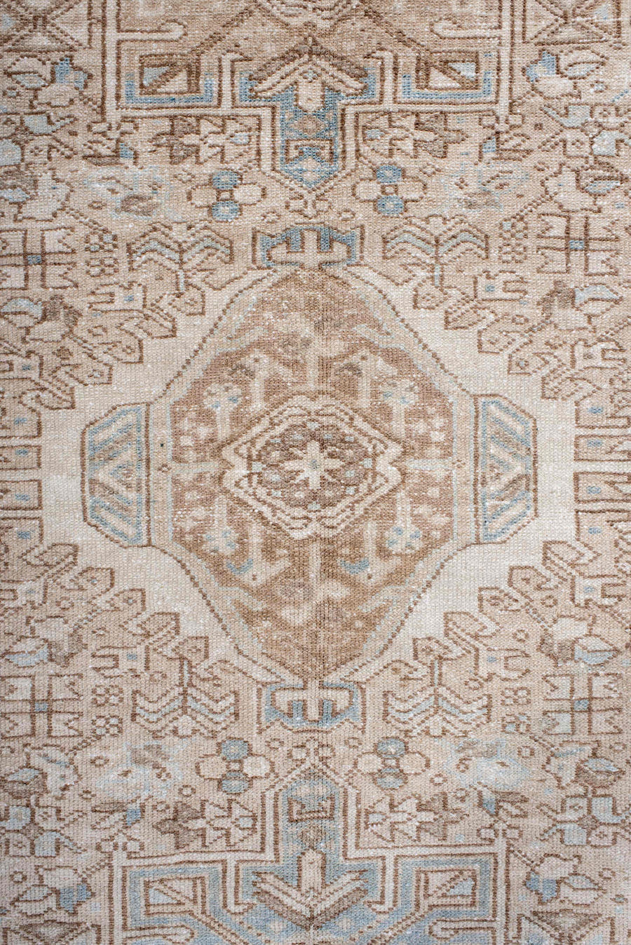 4' x 6' one-of-a-kind handmade antique Karaje rug. Color palette: camel, ivory, sky blue, taupe, beige, light blue, gray