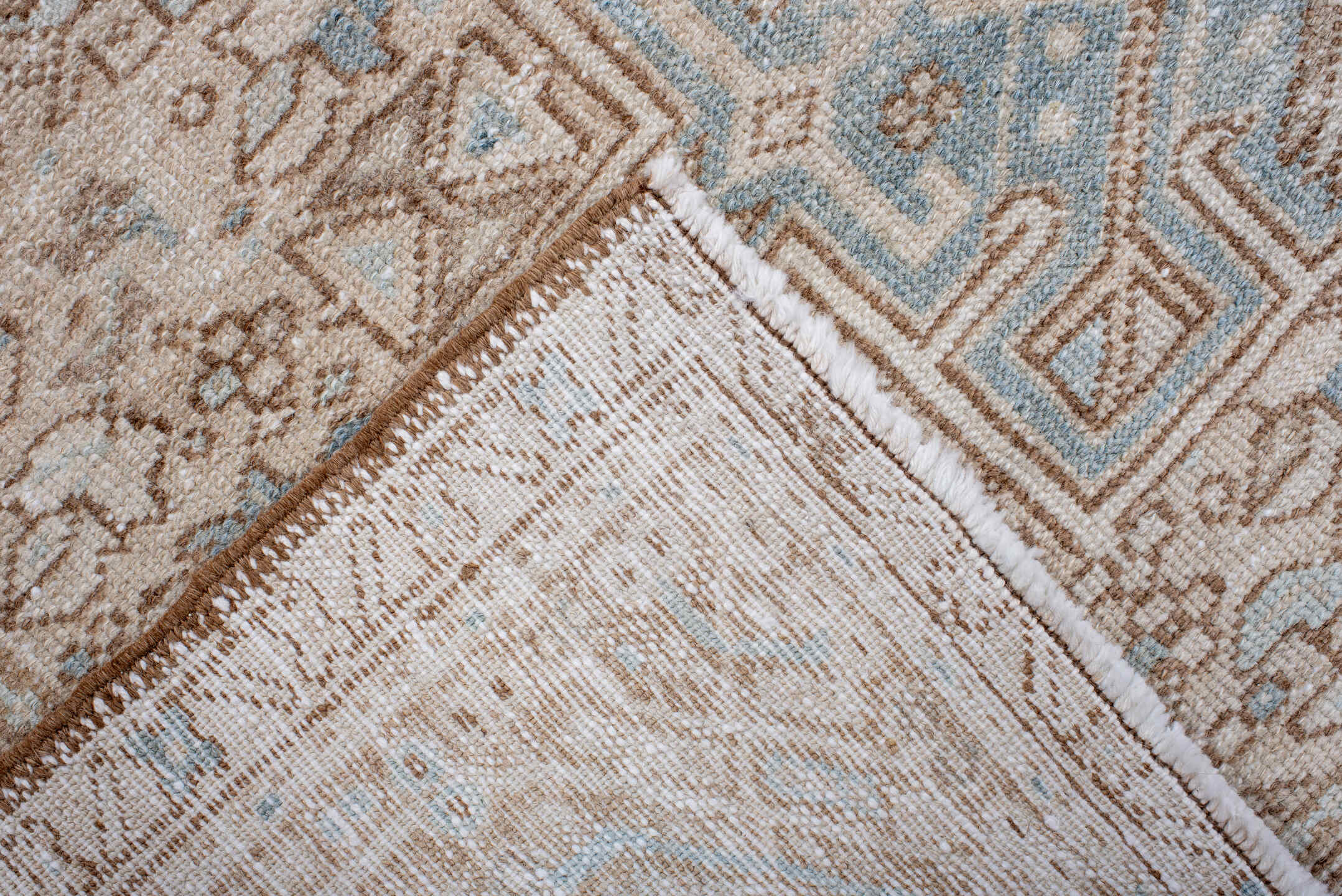 4' x 6' one-of-a-kind handmade antique Karaje rug. Color palette: camel, ivory, sky blue, taupe, beige, light blue, gray