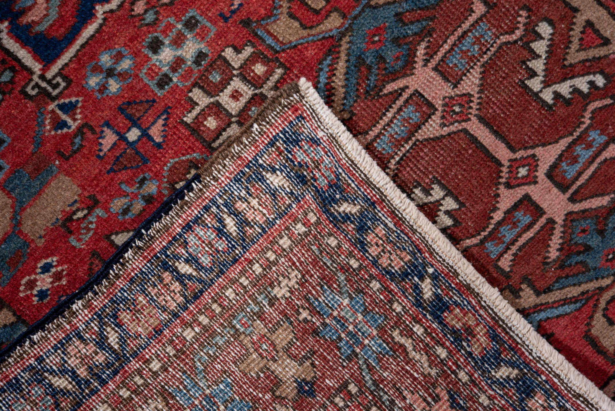 3' x 4' one-of-a-kind handmade vintage Heriz small size rug. Color palette: rust, navy, sky_blue, camel, ivory, rose, brown
