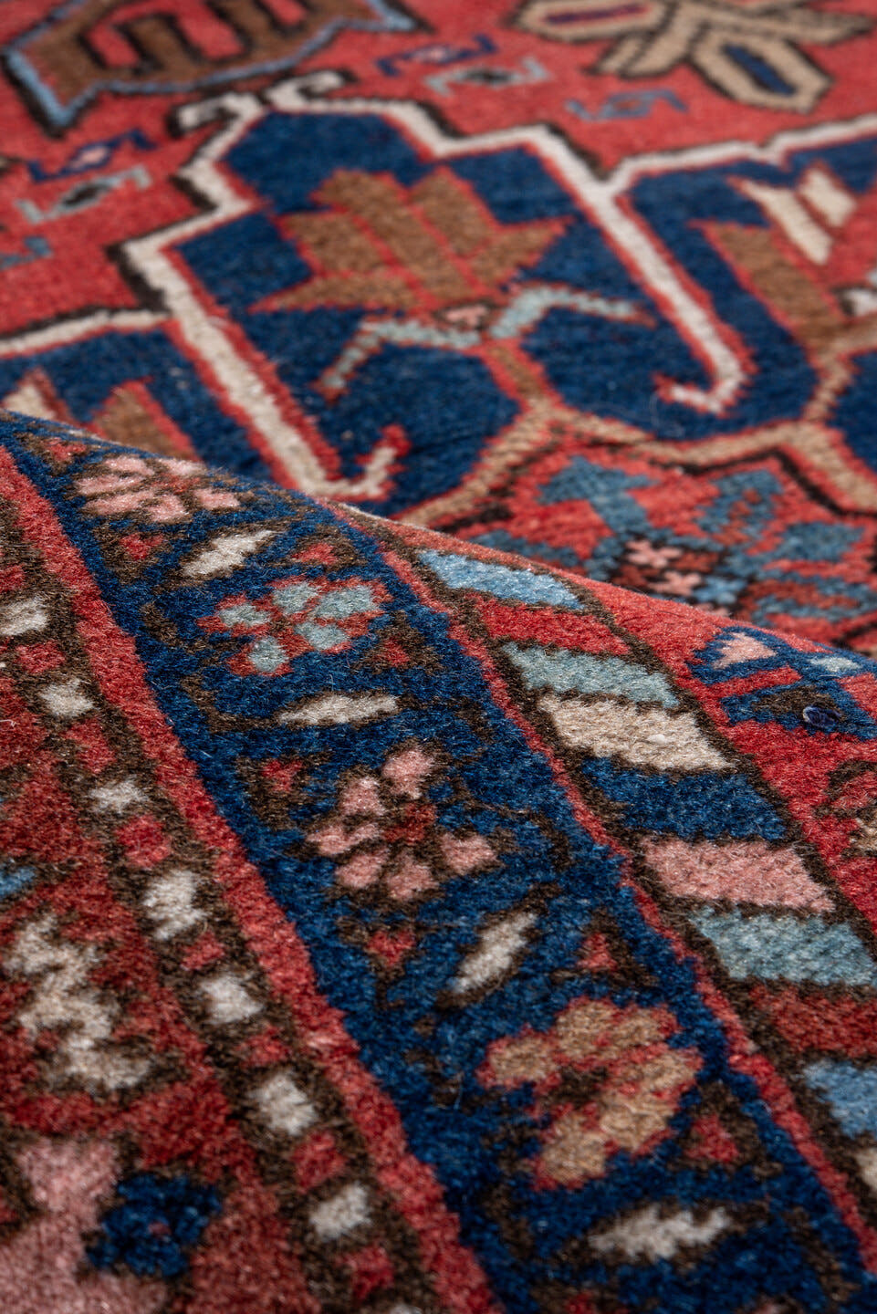 3' x 4' one-of-a-kind handmade vintage Heriz small size rug. Color palette: rust, navy, sky_blue, camel, ivory, rose, brown