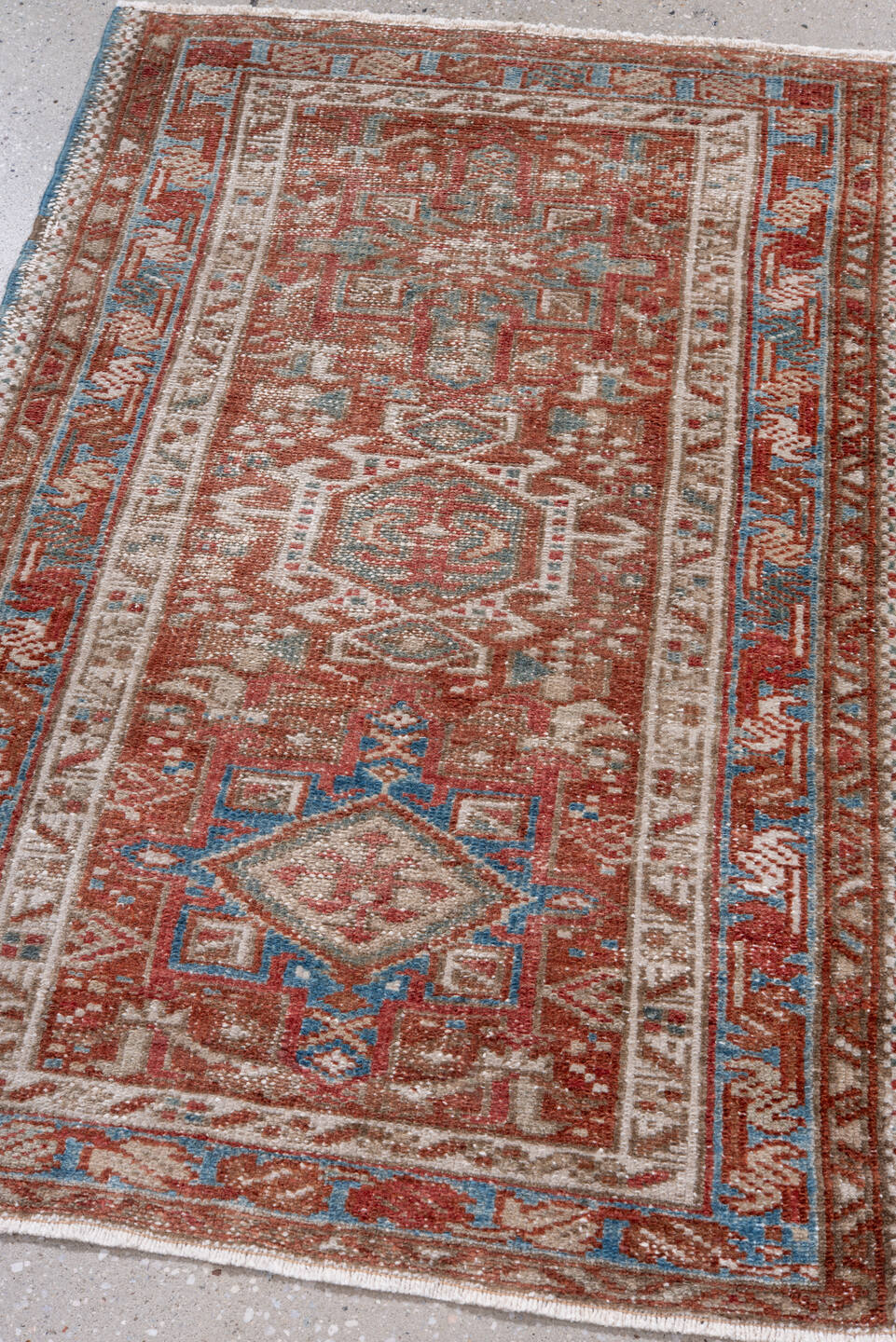 2' x 3' one-of-a-kind handmade antique Karaje small size rug. Color palette: rust, ivory, sky blue, taupe, brown, terracotta