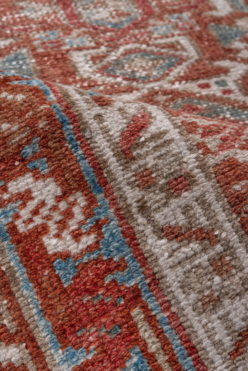2' x 3' one-of-a-kind handmade antique Karaje small size rug. Color palette: rust, ivory, sky blue, taupe, brown, terracotta