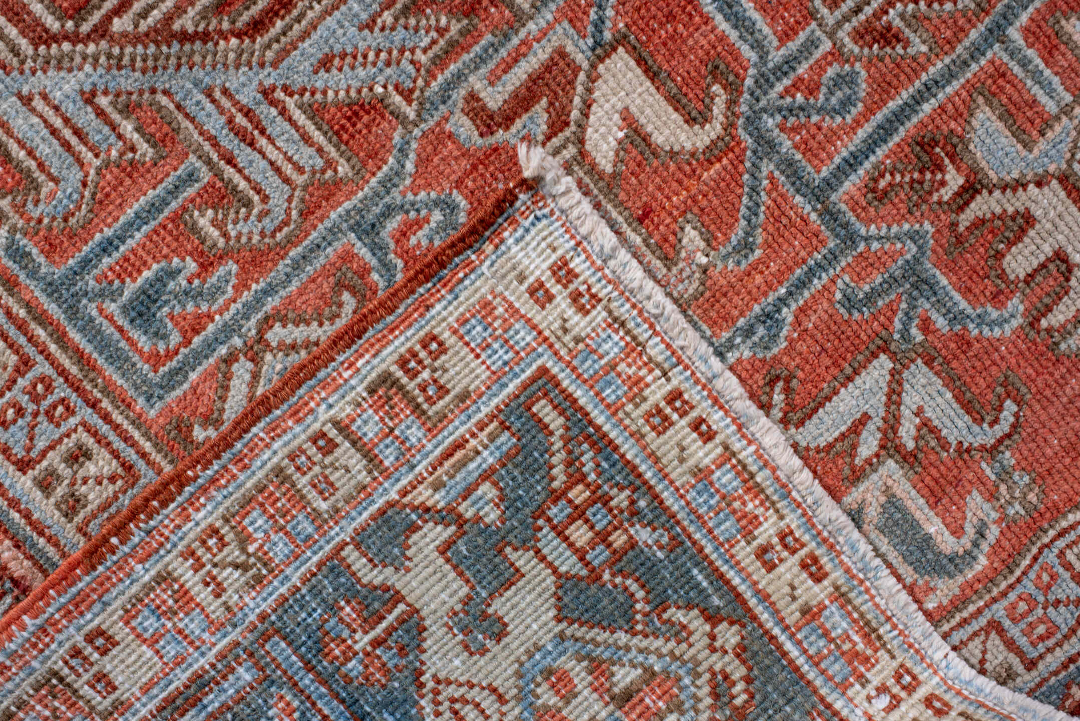 7' x 9' one-of-a-kind handmade antique Heriz rug. Color palette: rust, powder_blue, ivory, brown, slate, terracotta