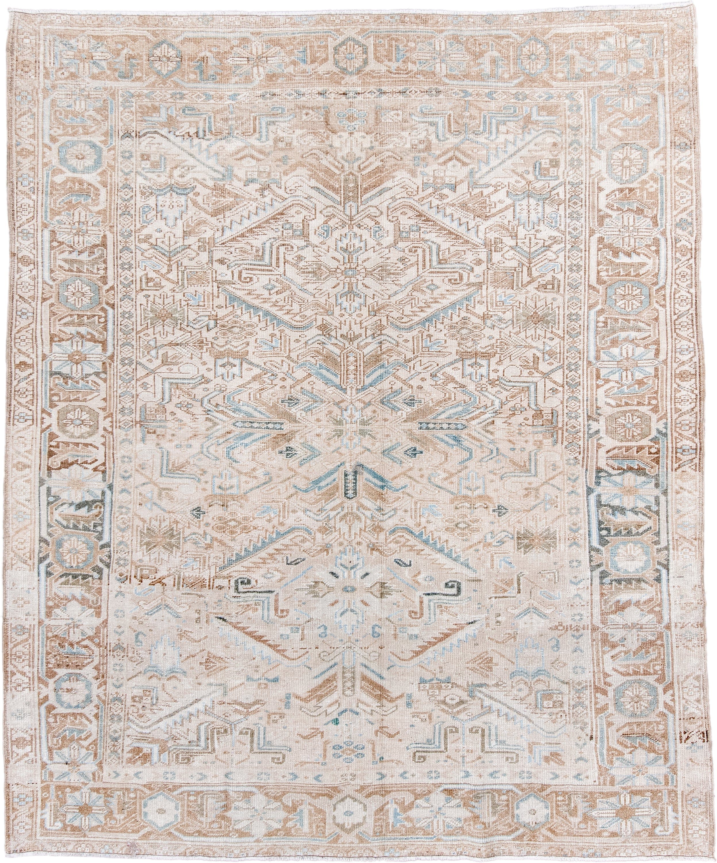 7' x 8' one-of-a-kind handmade antique Heriz rug. Color palette: ivory, camel, pale blue, taupe, beige, light brown