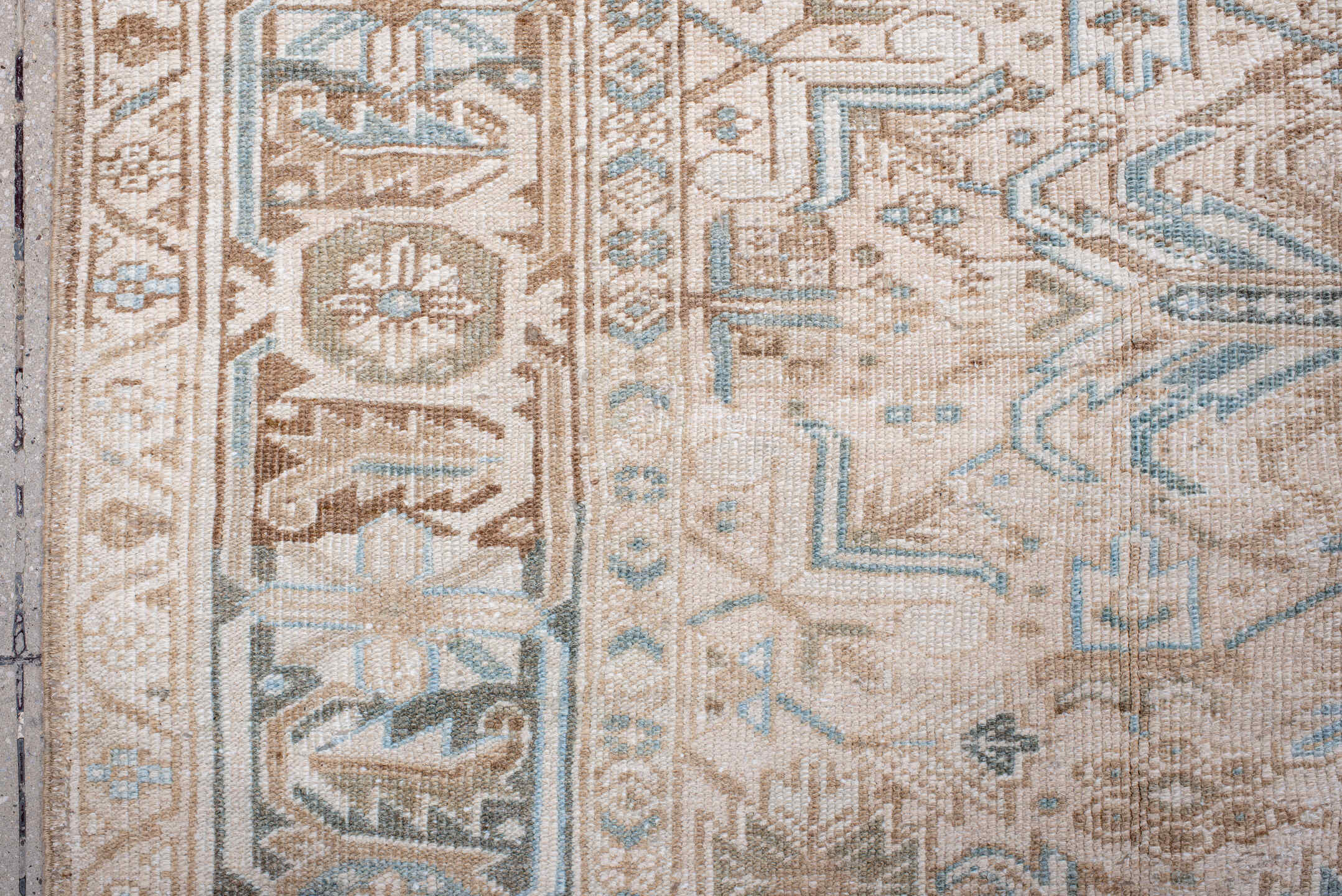 7' x 8' one-of-a-kind handmade antique Heriz rug. Color palette: ivory, camel, pale blue, taupe, beige, light brown